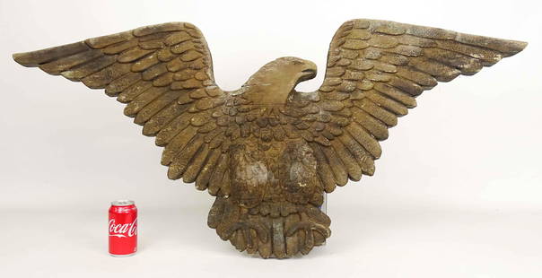 Eagle Wall Plaque: 19th c. pine carved eagle wall plaque. Old surface. 48" x 22", 2" thick.