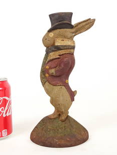 Doorstop: Rabbit with top hat cast iron doorstop. C. 1920, National Foundry, Whitman, Mass. Inscribed "89", backside. Ref: The Doorstop Book, Smith, p. 156. 10 1/2" Ht..