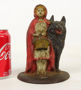 Doorstop: Little Red Riding Hood cast iron doorstop. C. 1920, Albany Foundry, Albany N.Y.. Inscribed "94" backside. Ref: The Doorstop Book, Smith, p. 199. 7 1/4" Ht..