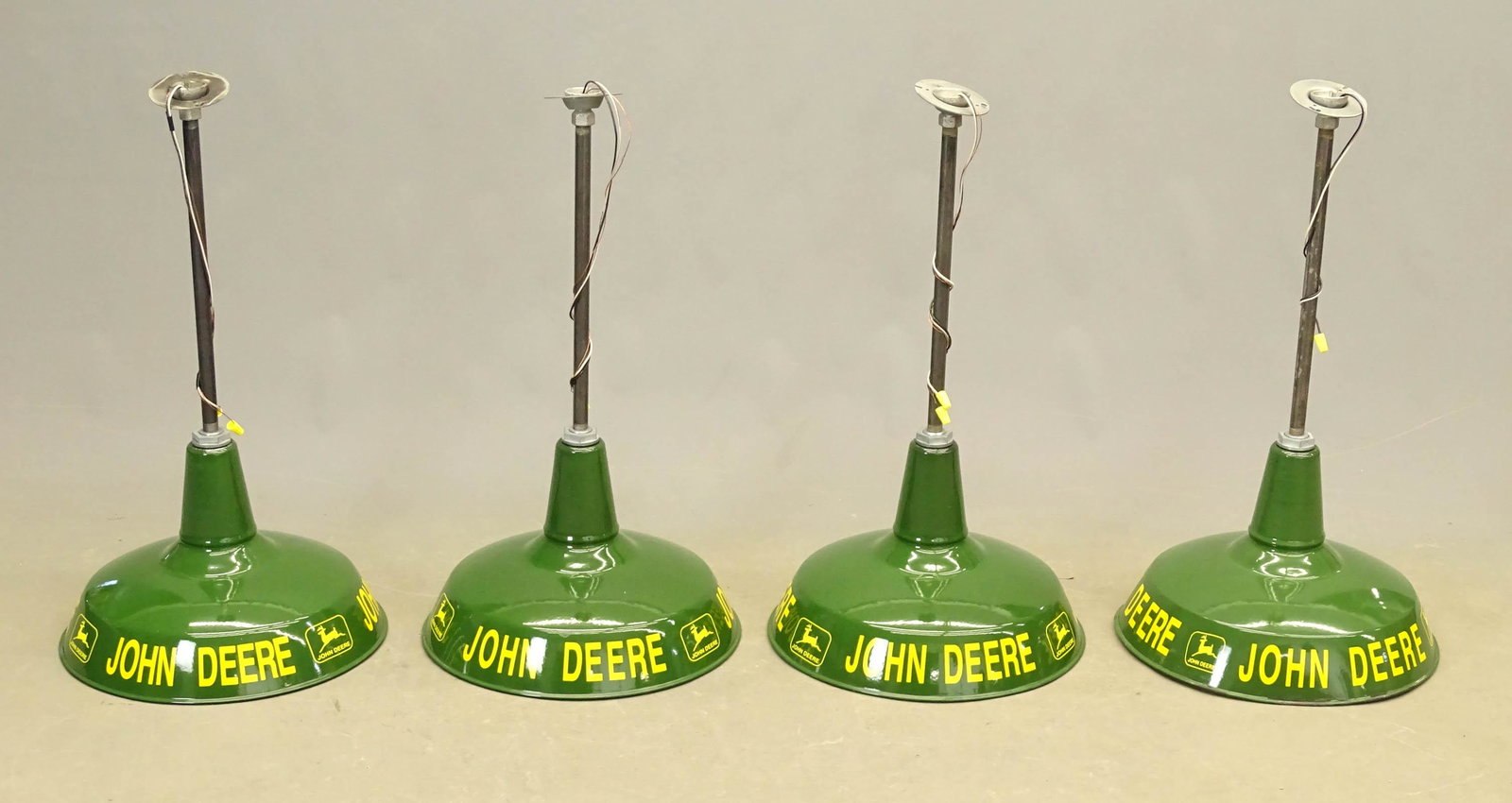 John Deere Hanging Shades: Lot (4) John Deere hanging shades. New Old Stock. 18" D., 32" Ht.