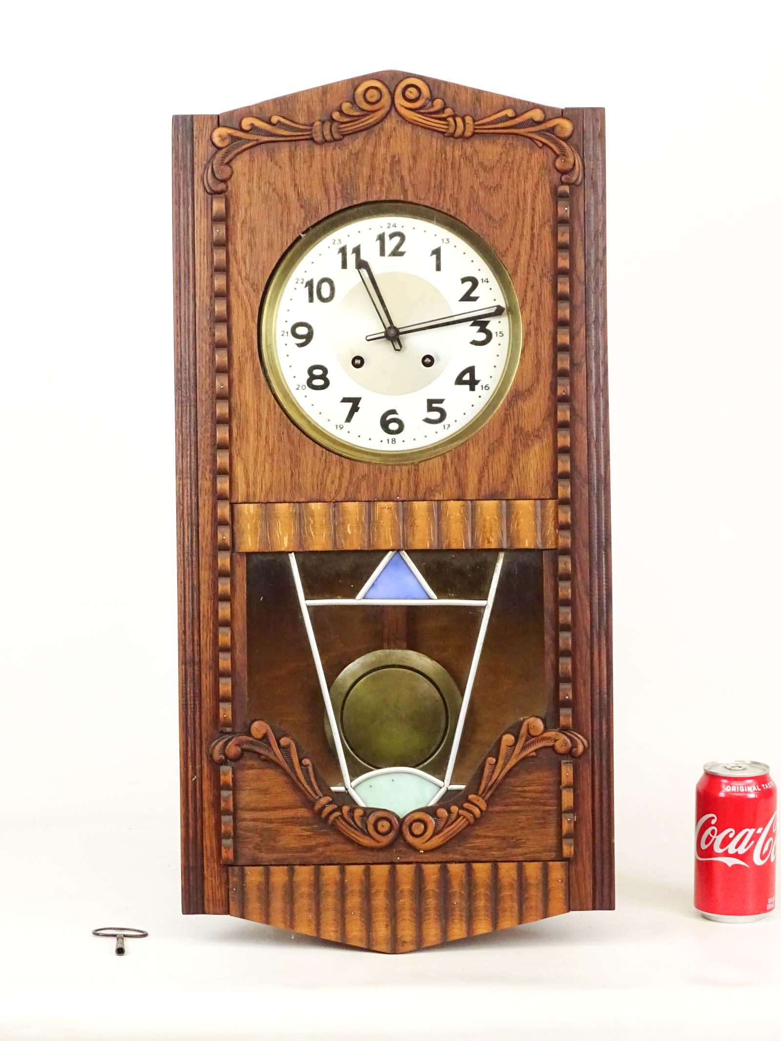 Continental Art Deco Wall Clock: Continental Art Deco wall clock. 13 1/2" x 5" x 27".