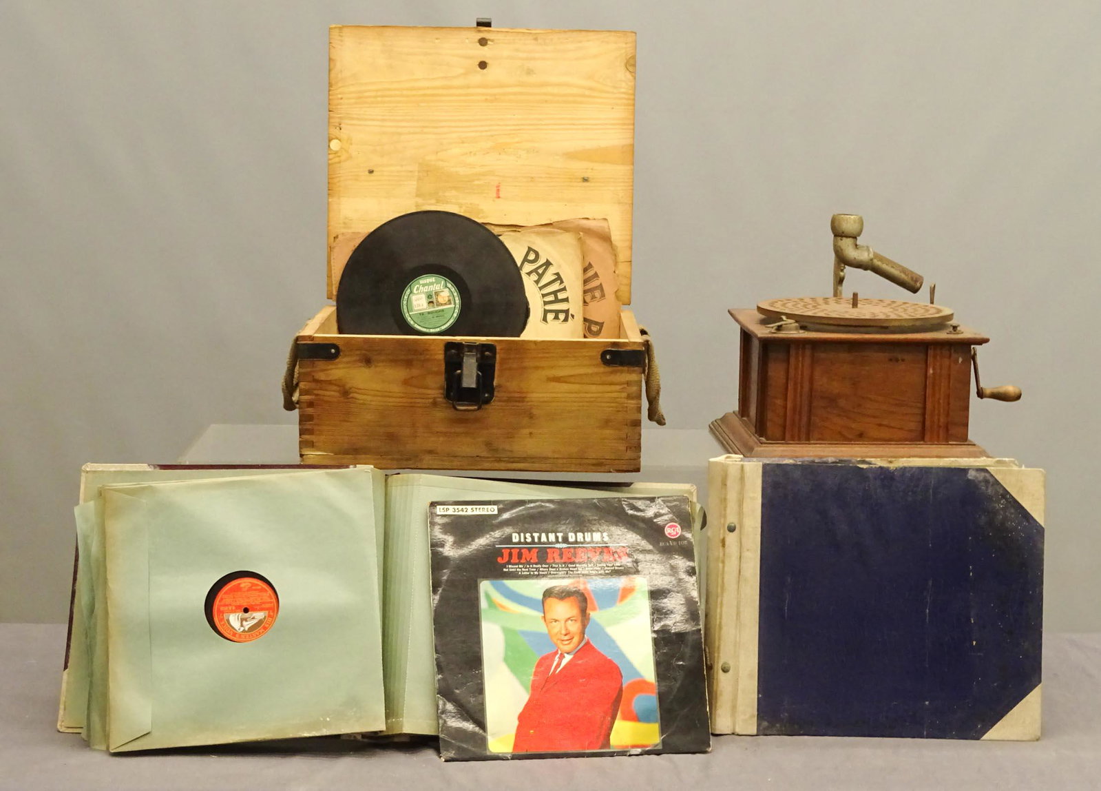 Vintage Phonograph with Records: Vintage phonograph (marked "AEROPHONE / BRUXELLES", along with vintage records.