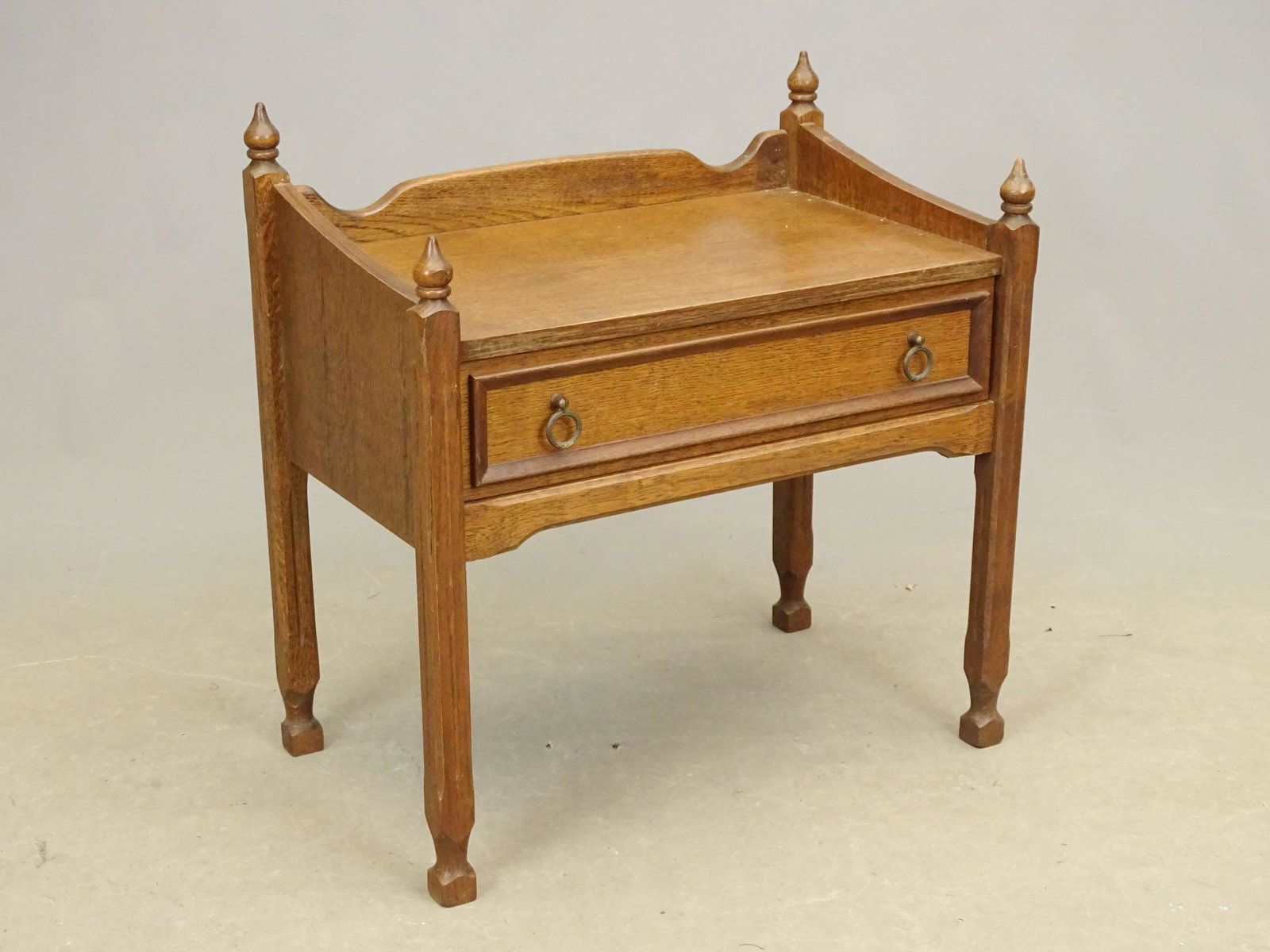 Oak Side Table: Oak single drawer side table with splashback. 23 1/2" x 14 1/2" x 24 1/2".
