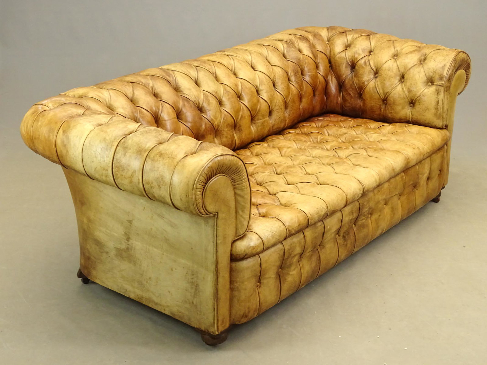 Leather Chesterfield Sofa: Leather Chesterfield sofa. 80" x 35" x 30".