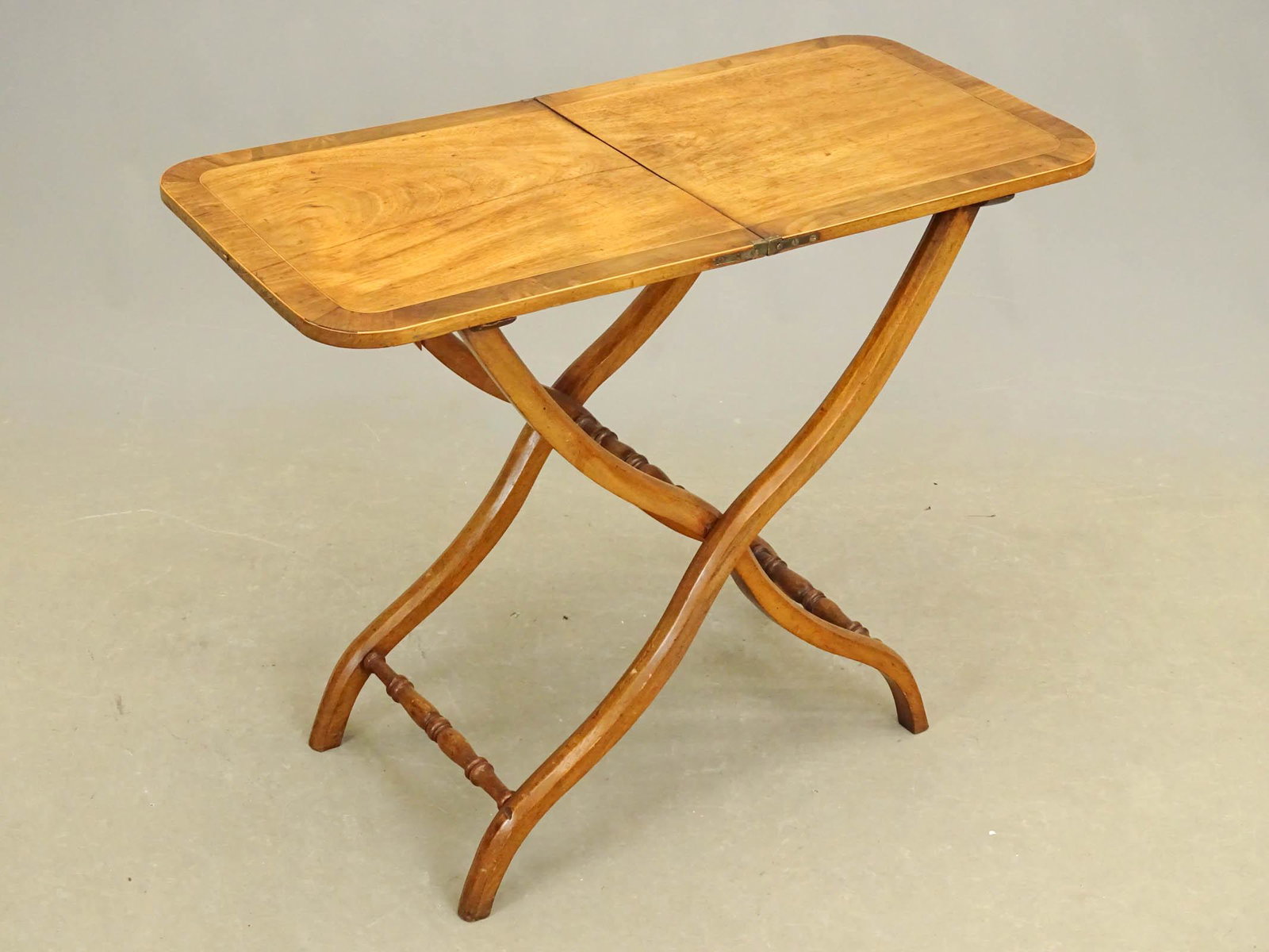 Early Mahogany Folding Table: Early mahogany folding table.