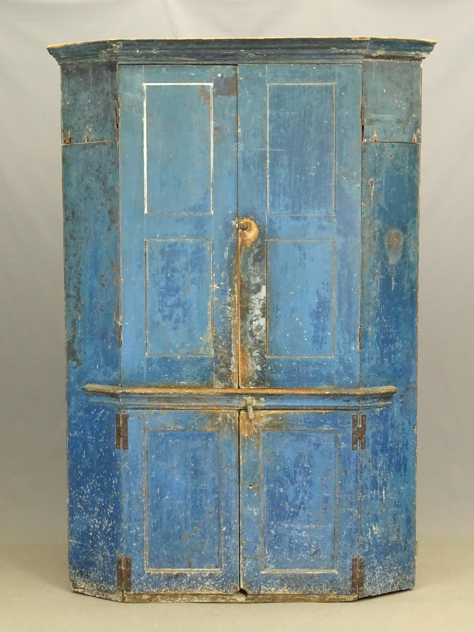19th c. Hudson Valley Corner Cupboard: Large 19th c. Hudson Valley corner cupboard in old blue paint. Imperfections. 52" x 37" x 81 1/2". Provenance: Estate of Philip And Kathleen Seibel, Catskill New York.