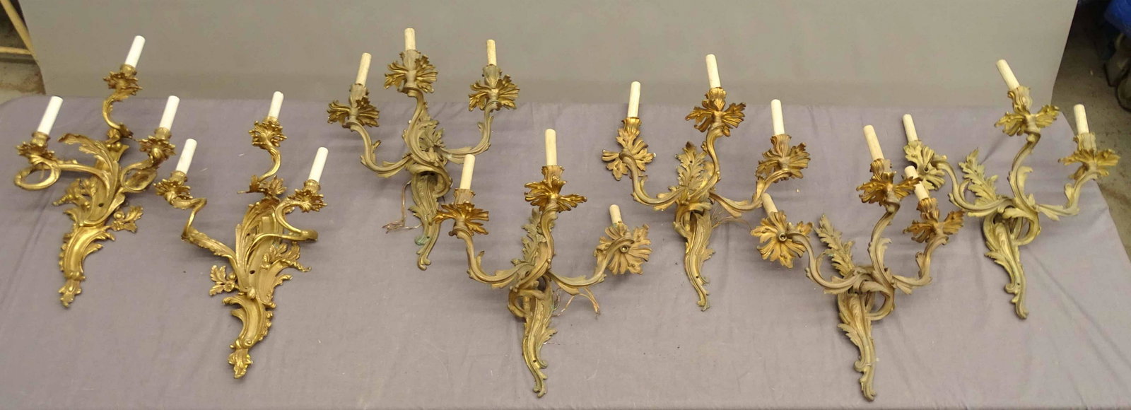Wall Sconces: Lot (7) brass wall sconces. Approx. 17" x 21".