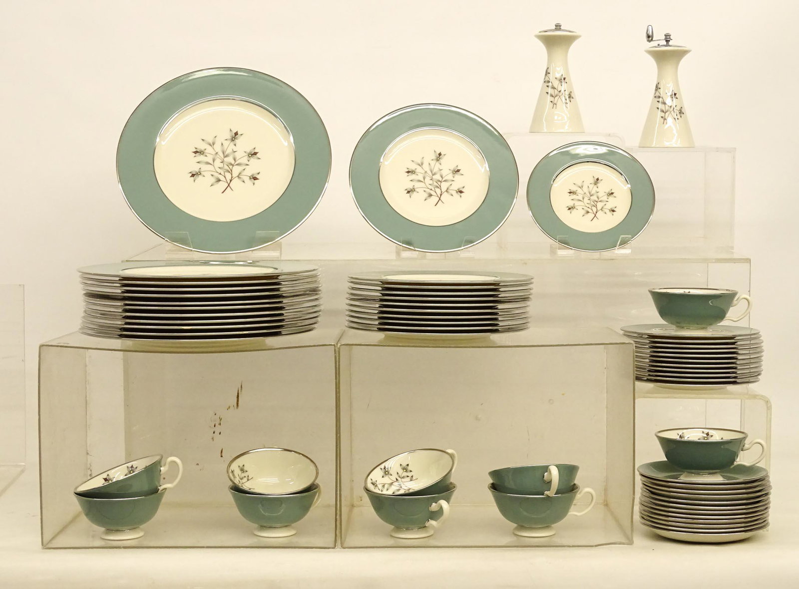 Lenox Dinner Service: Lenox "Kingsley" dinner service. Includes (12) 10 1/2" plates, (11) 8 1/4" plates, (12) 6 1/4" plates, (10) cups and saucers, salt and peppers.