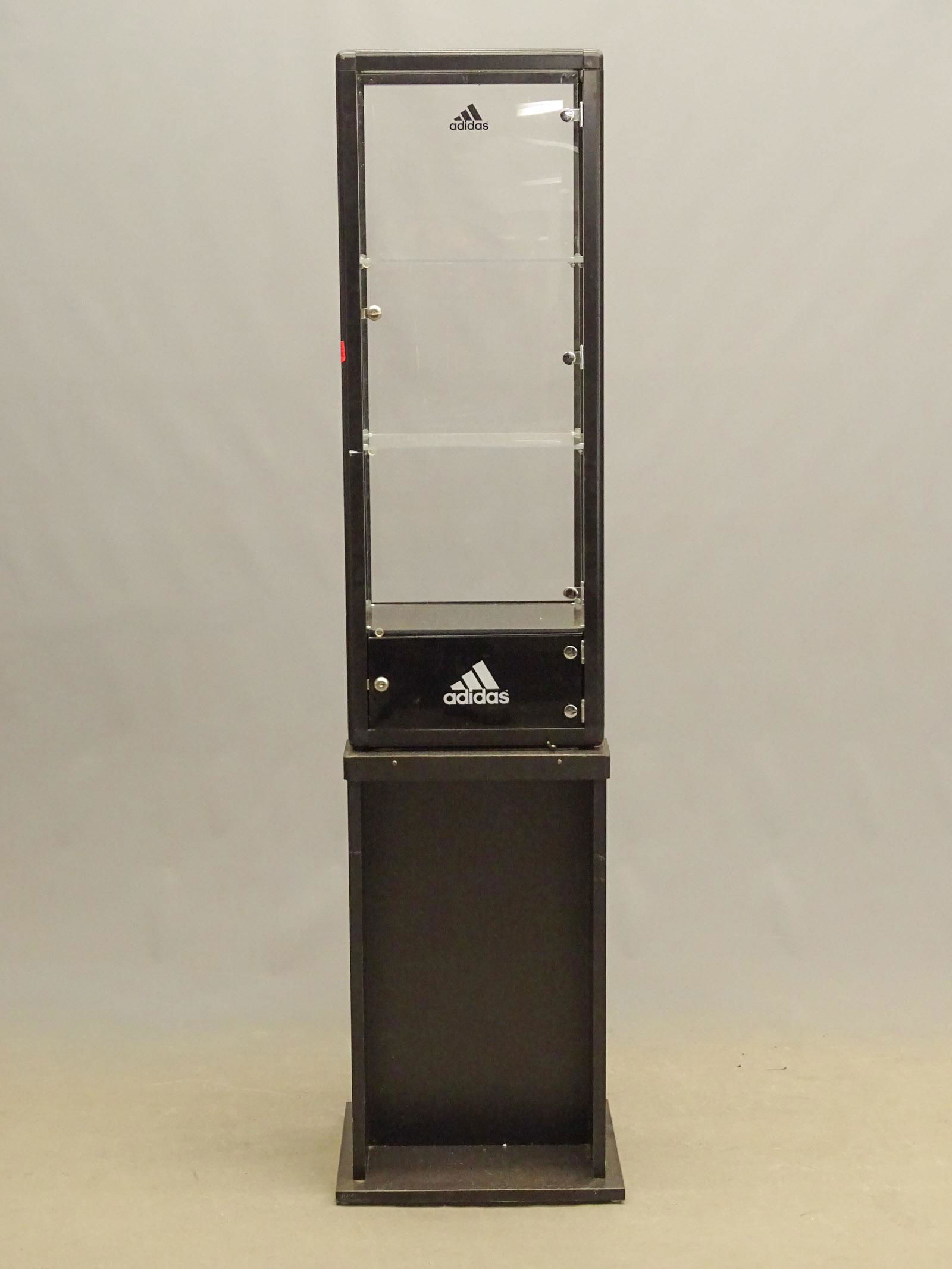 Showcase: Adidas display case. 16" x 13" x 70".