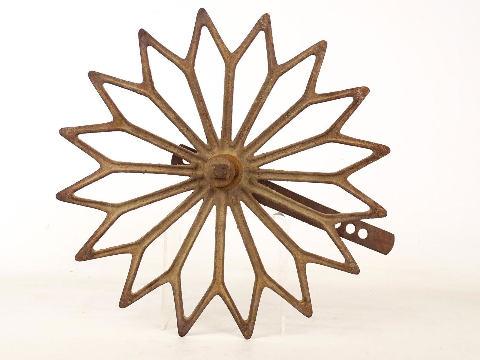 Cast Iron Well Wheel: Early cast iron well wheel.