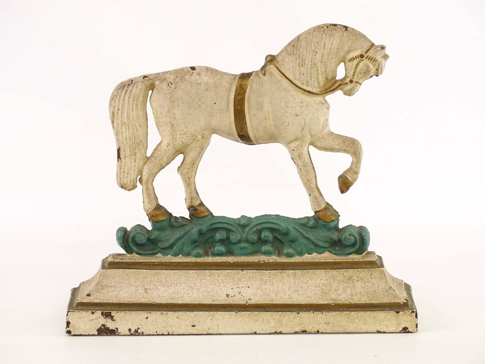 Doorstop: Cast iron painted performing horse doorstop. 12" x 11".