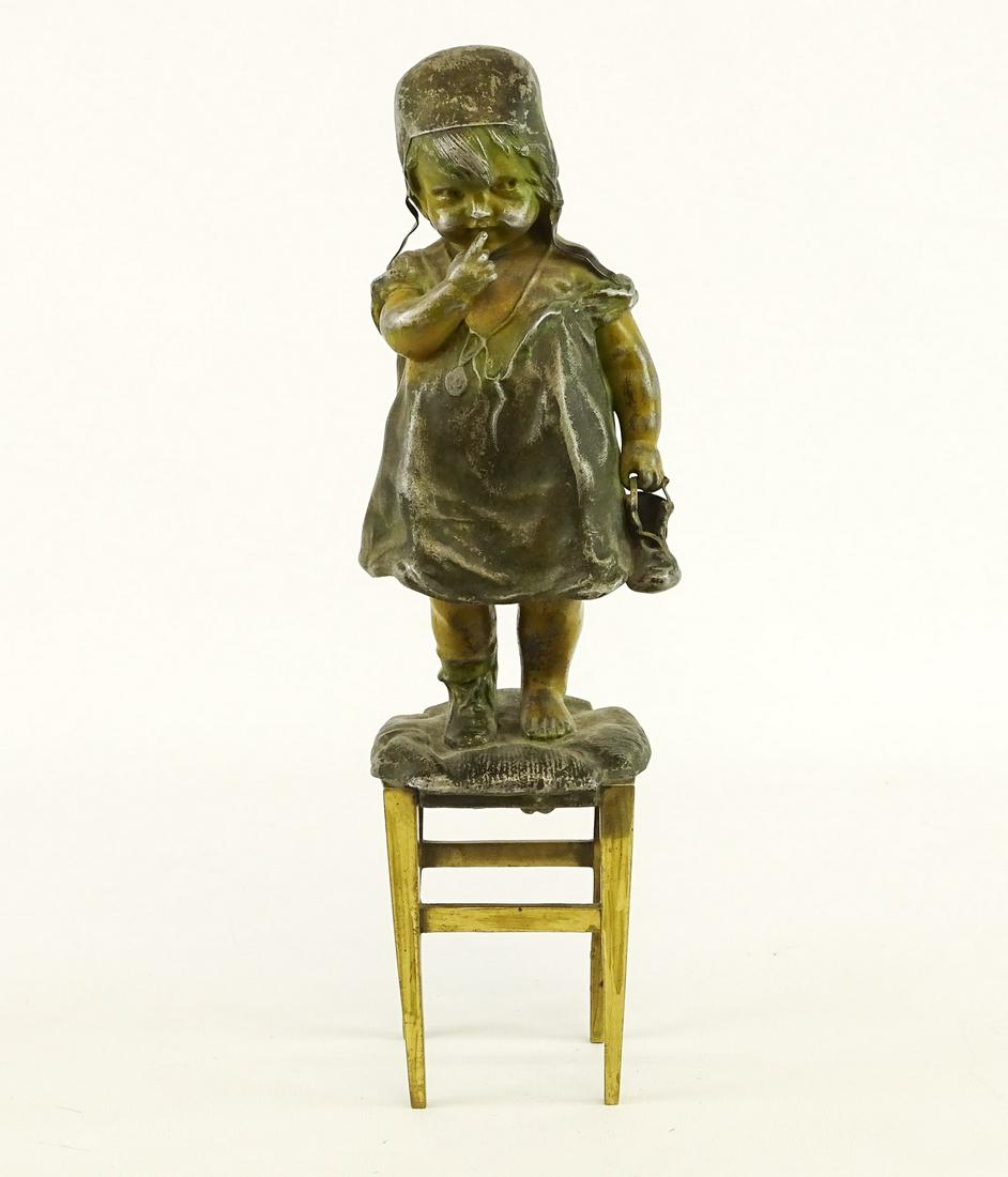Statue of Little Girl: White metal and brass statue of little girl on stool. 13 1/2" Ht..