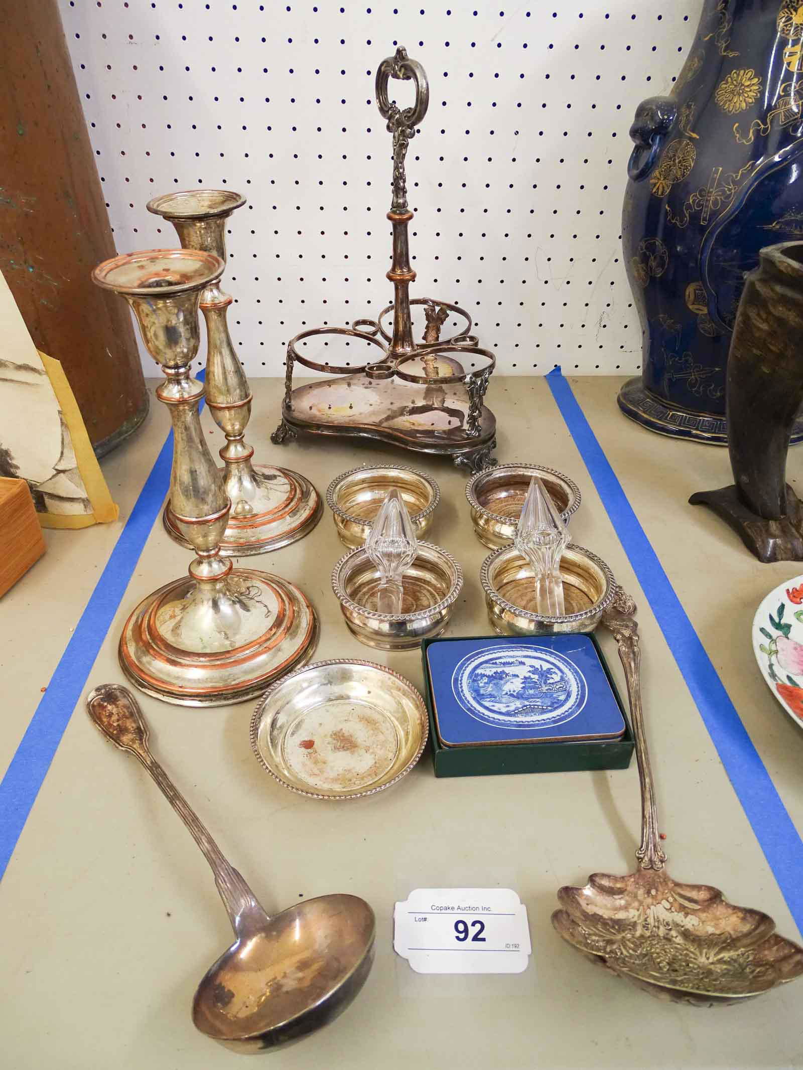 Misc. Lot: Misc. lot including pair silverplate candlesticks (10 3/4" Ht.), wine coasters, (2) finials, dish, coasters, silverplate server.