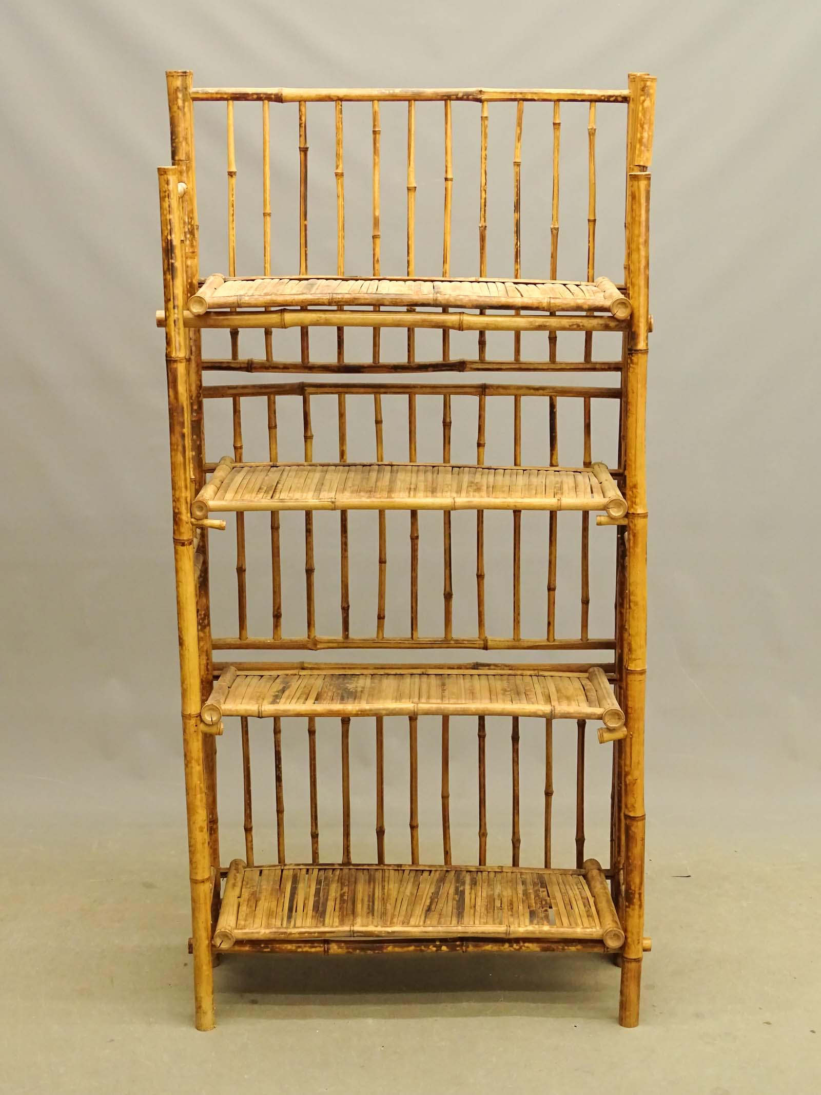 C. 1900's Bamboo Shelf: C. 1900's bamboo shelf. 28" x 12" x 59". As found.