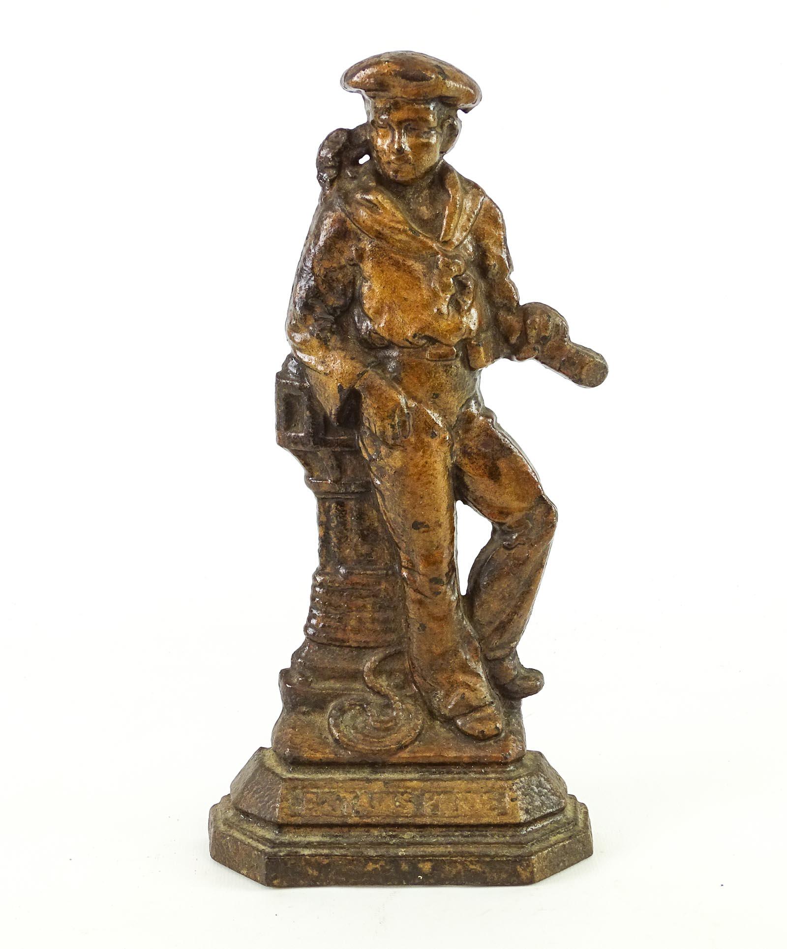 Doorstop: Cast iron doorstop "BRITAIN'S PRIDE". 11 3/8" Ht..