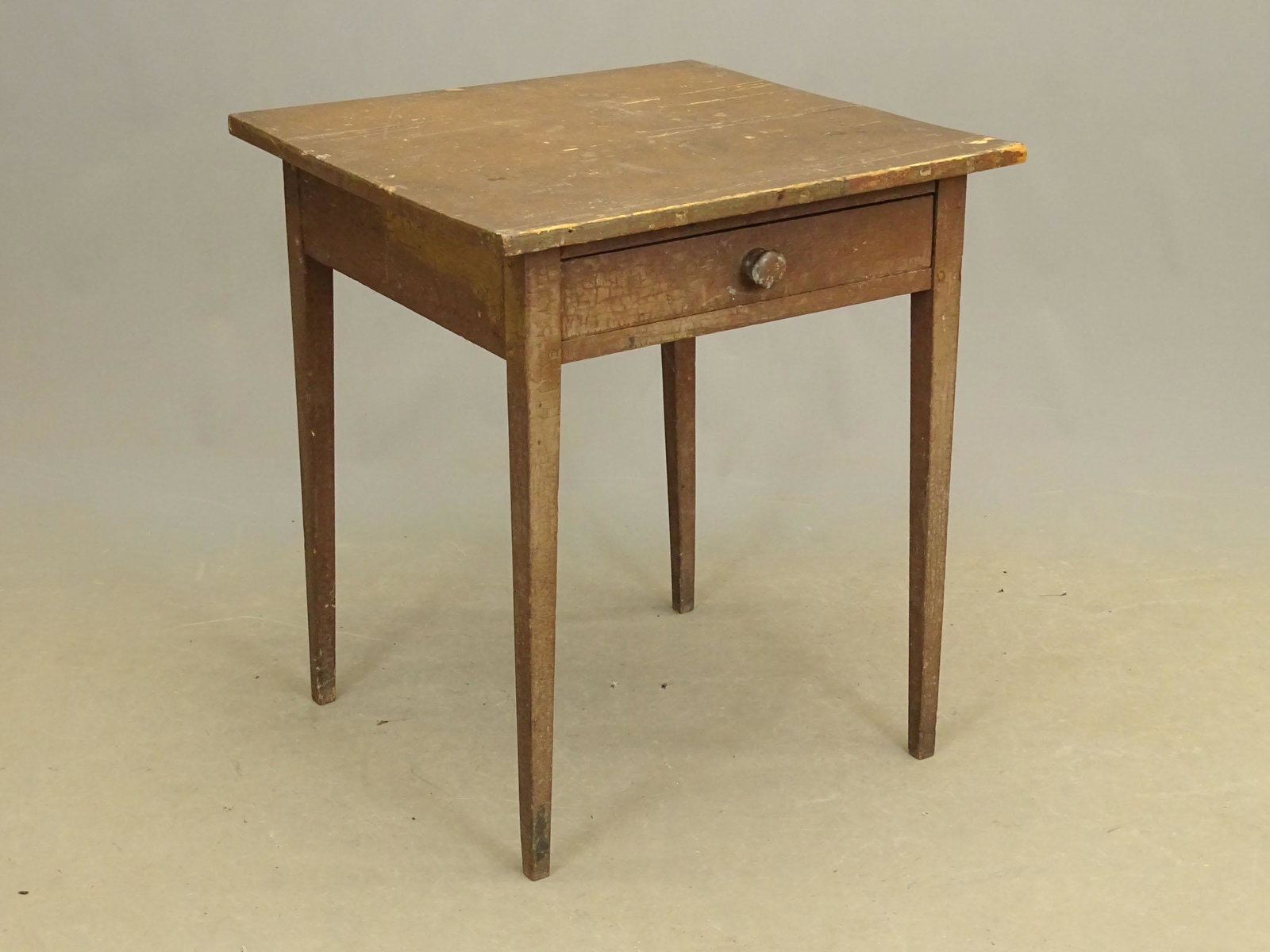 19th c. Stand: 19th c. single drawer stand with tapered legs. Old paint surface. 25" x 24 3/4" x 28". Provenance: Estate of Philip And Kathleen Seibel, Catskill New York.