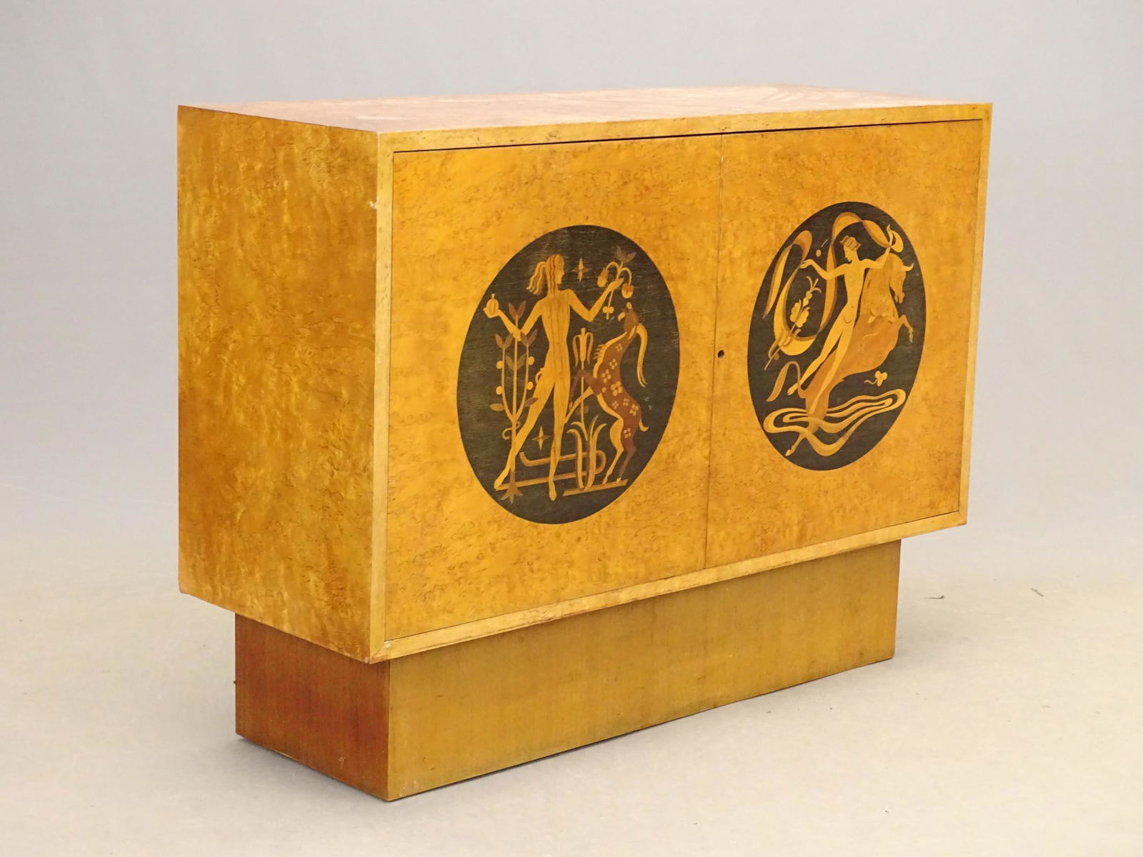 Art Deco Inlaid Cabinet: Art Deco inlaid two door cabinet. 45" x 16" x 33 1/2". From the Estate of Andrew Szoke, an important American designer of the 1930s to 1950s. This was purchased from his son, who inherited it from his