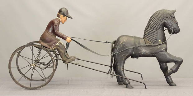 Folk Art Horse & Jockey: Folk art wooden painted horse and jockey. Approx. 50" L..