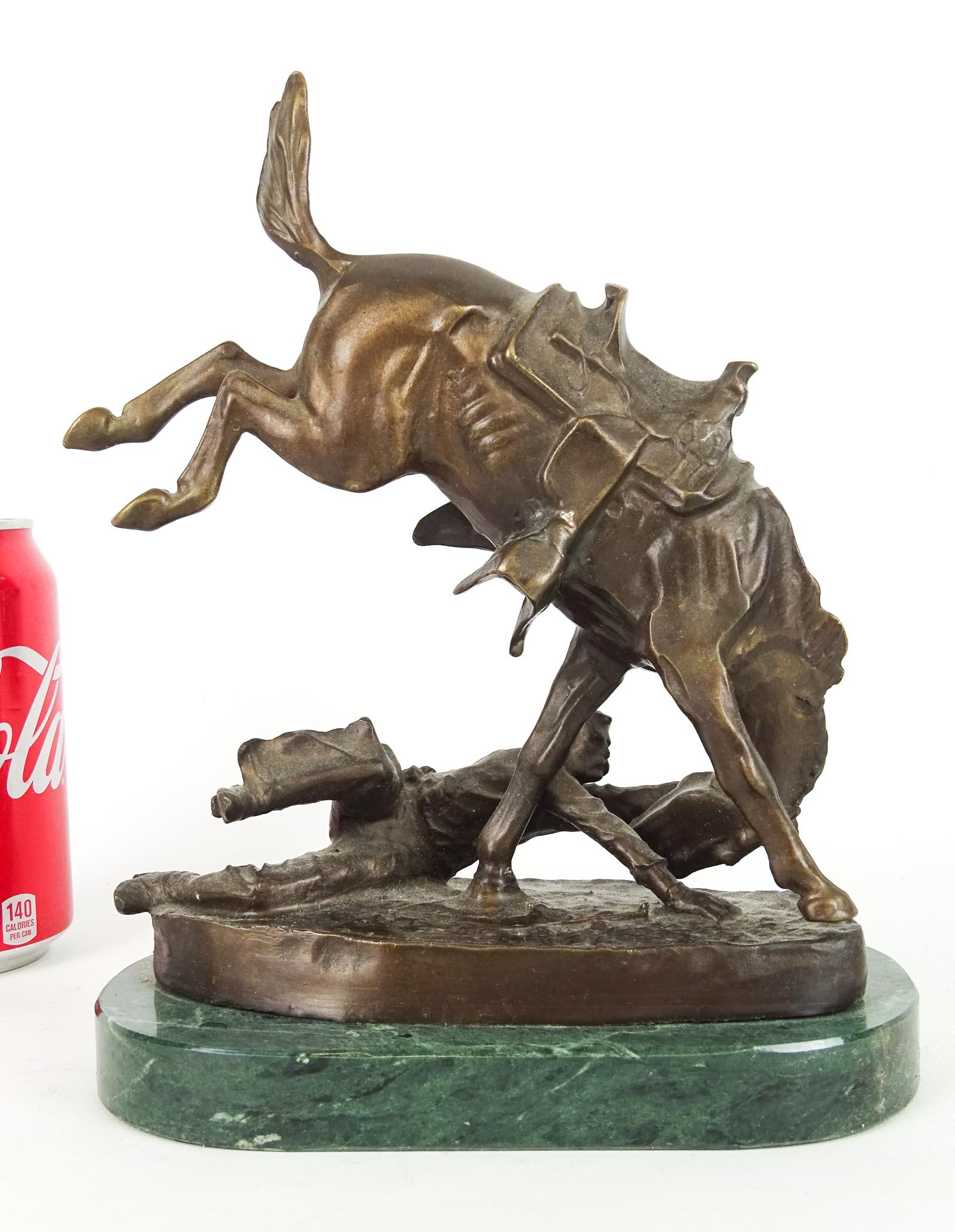 Bronze: Bronze on marble base, cowboy and horse. 7" W. x 9" Ht.. Marked Frederic Remington (after).