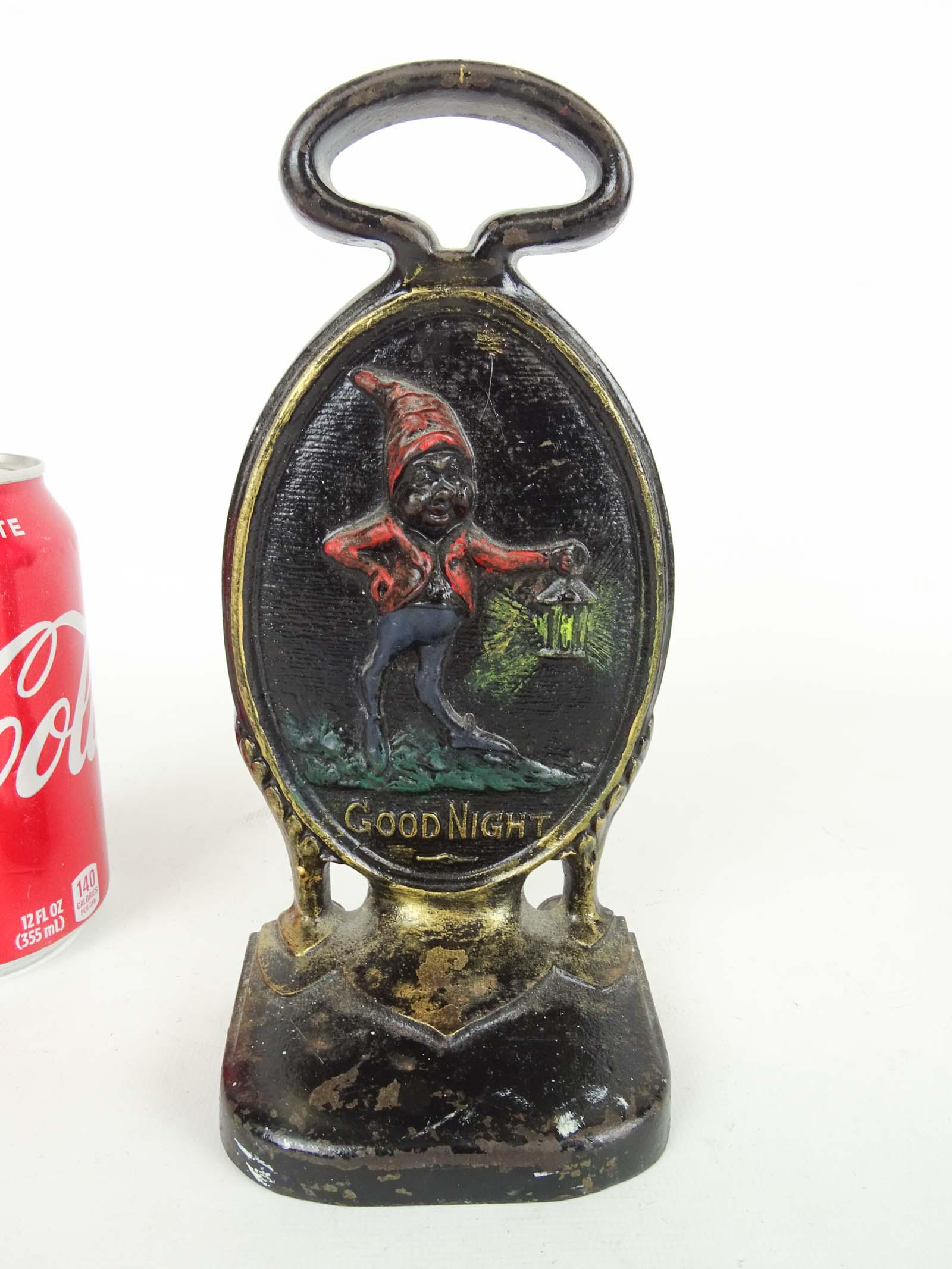 Doorstop: Cast iron Bradley & Hubbard "GOOD NIGHT" doorstop. 8 1/4" Ht..