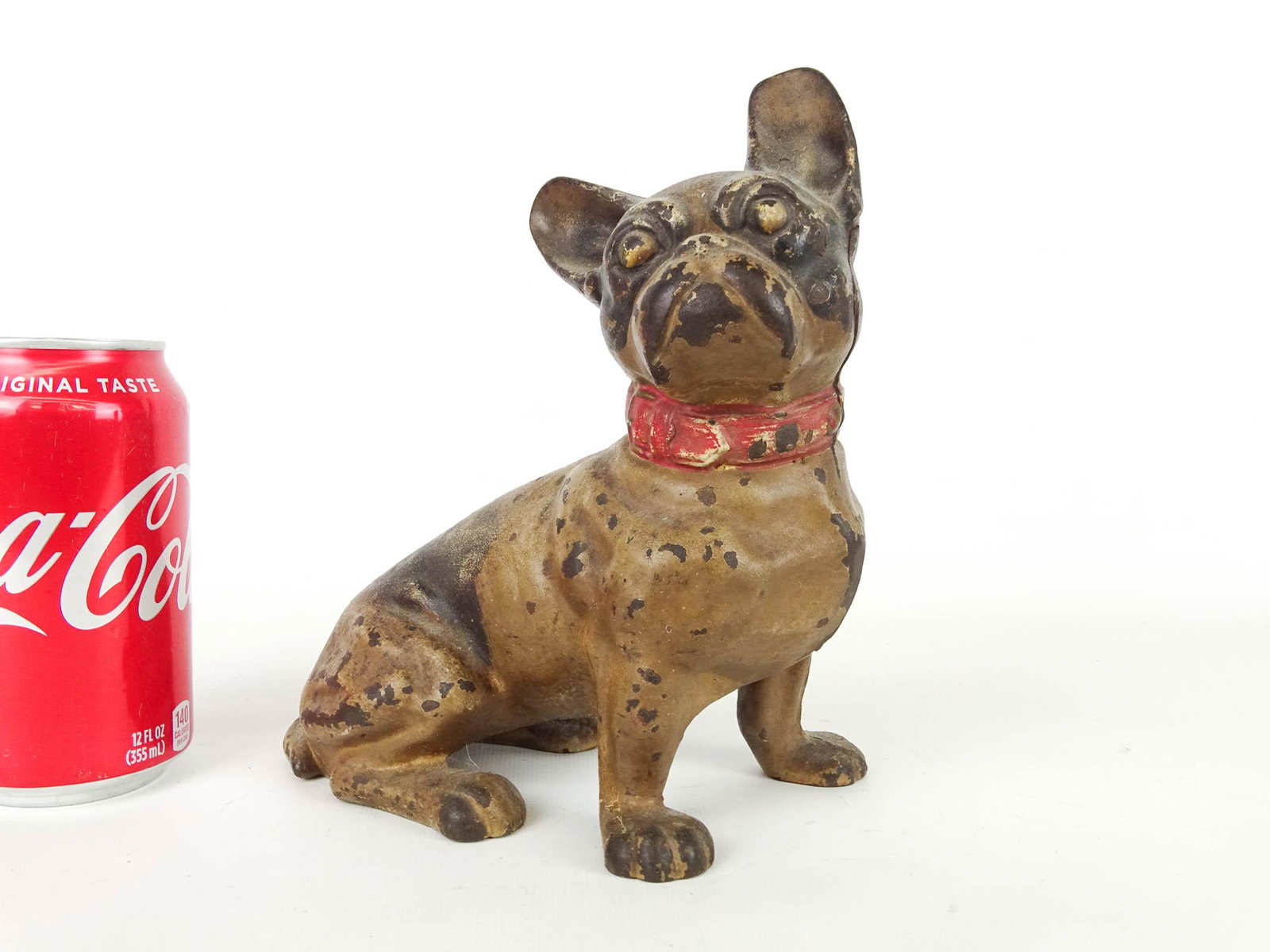 Doorstop: Cast iron painted French Bulldog doorstop. 8 1/4" Ht..