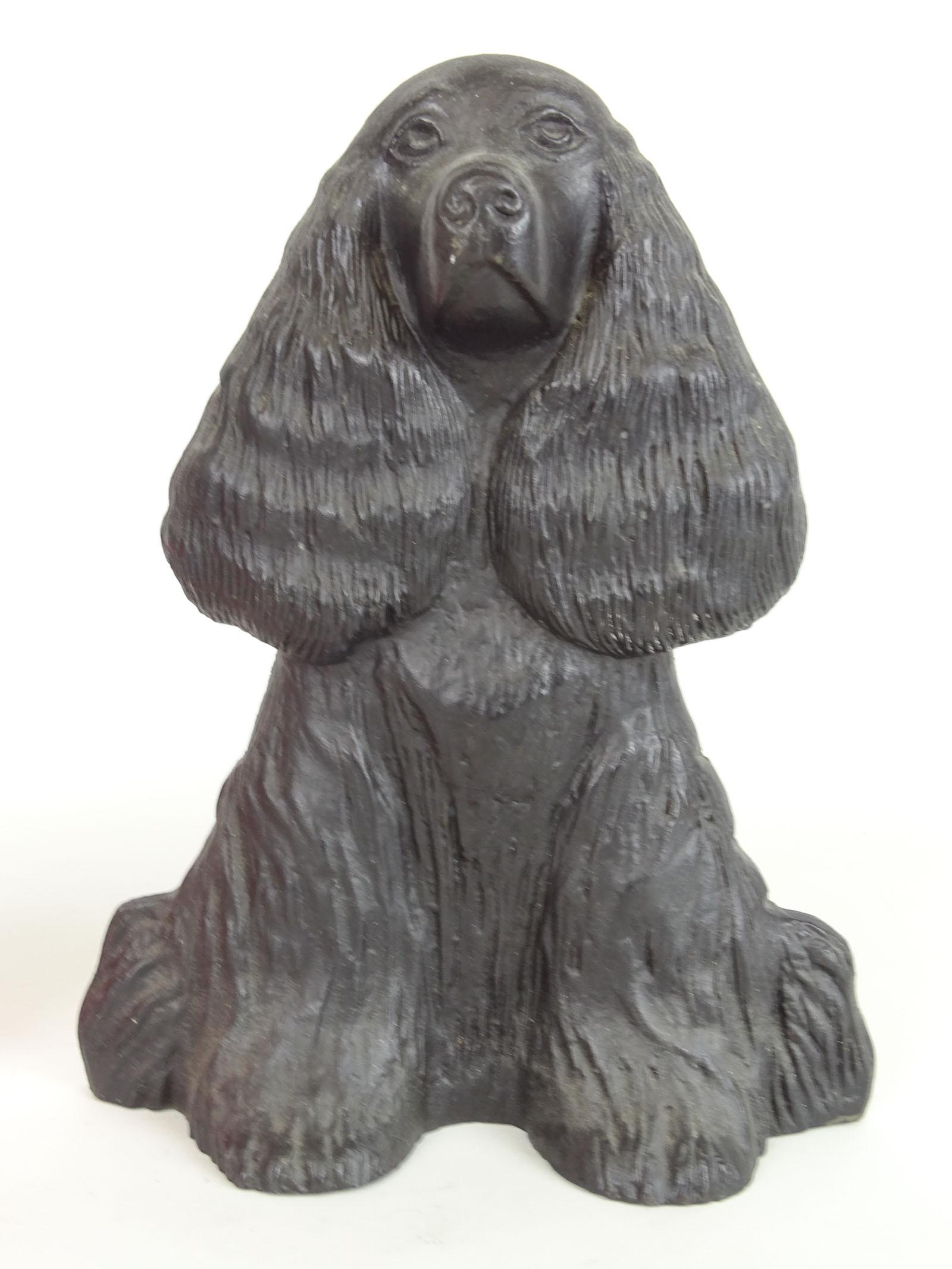 Doorstop: Virginia Metal Crafters cast iron dog doorstop in black paint. 9" Ht..