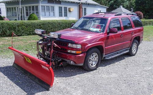 2004 Chevrolet Tahoe Suburban Vehicle: 2004 Chevrolet Tahoe Suburban vehicle. (4) door "Z 71", Vortec V8 engine, automatic transmission, air conditioning, leather interior, power windows, 113057 miles. Western snow plow attached. Vin numbe