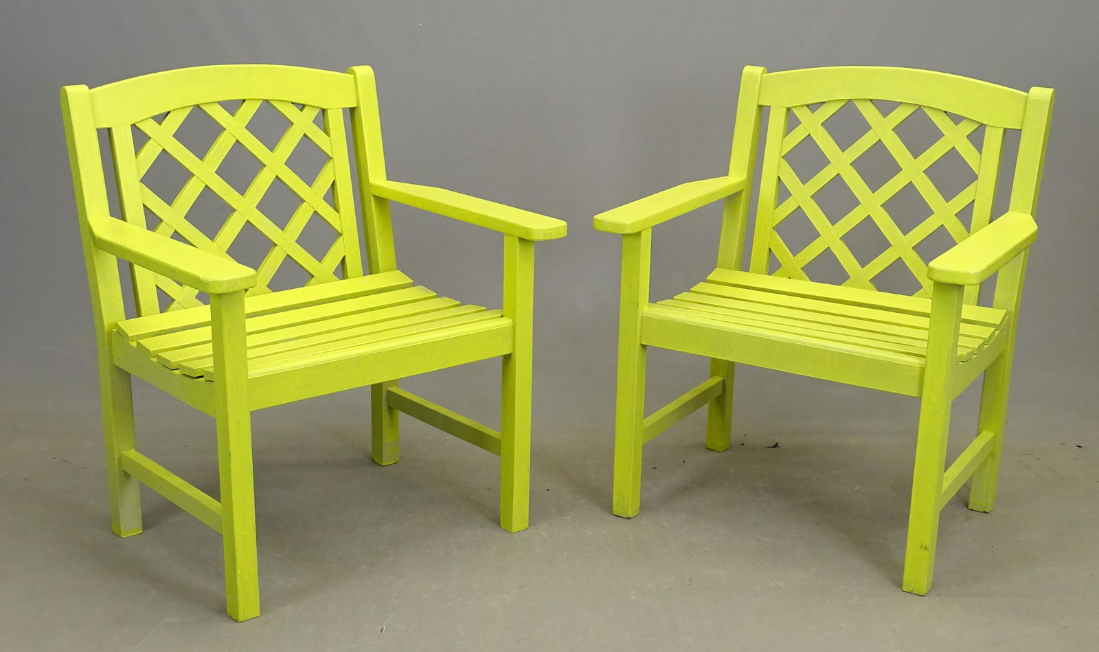 Pair Garden Chairs: Pair wooden garden chairs in green paint. 29 1/2" x 23 1/2" x 35 1/2".