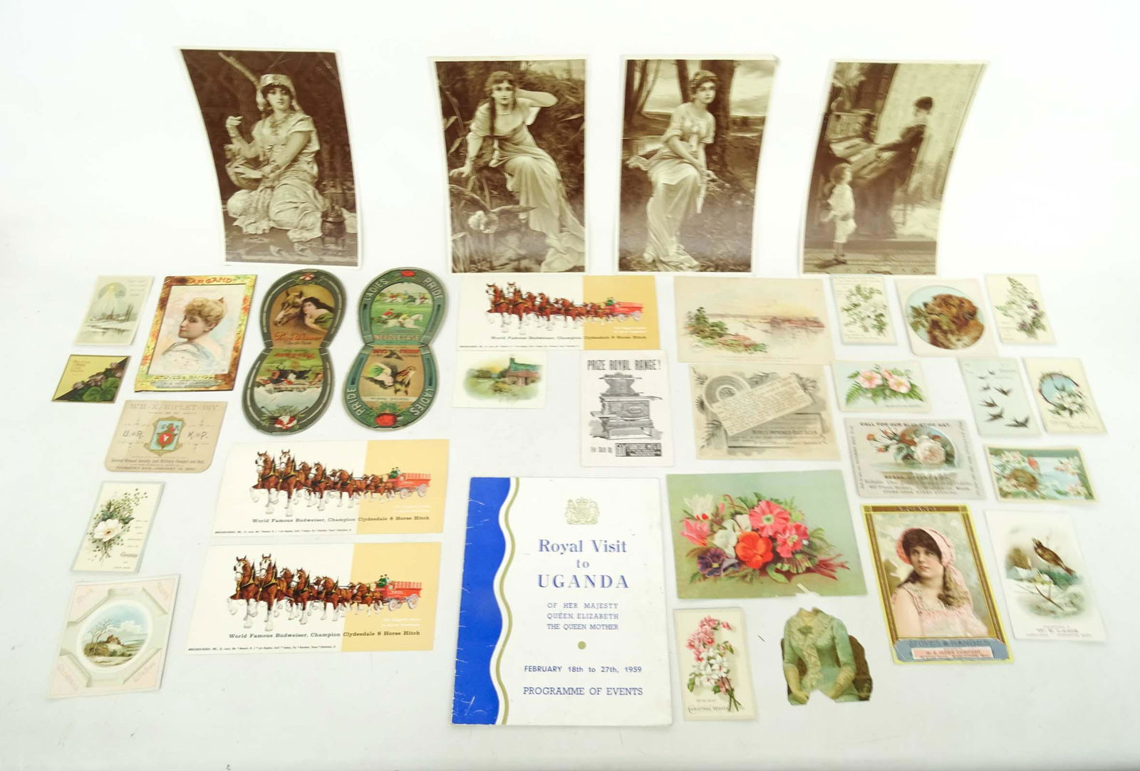 Ephemera Lot: Ephemera lot including (27) Victorian trade cards, Royal Visit to Uganda, Of Her Majesty Queen Elizabeth The Queen Mother....1959 program, needle cases, Budweiser cards.