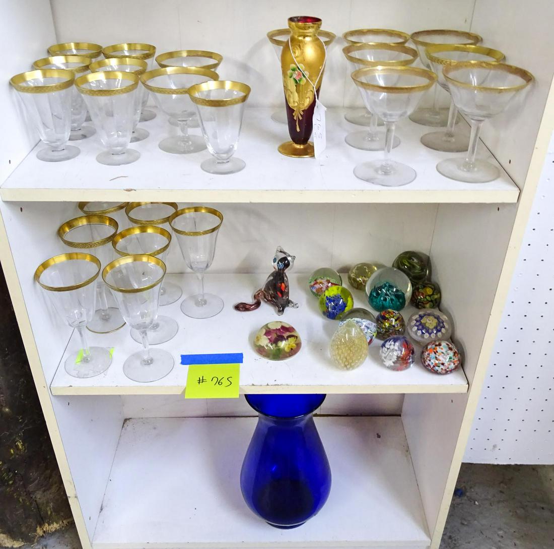 Misc. Lot: Misc. lot including (12) paperweights, 12" cobalt vase, 4 1/2" cat paperweight, gold rim stemware including (7) 4 3/4", (2) 3 1/2", (7) 4", (7) 6 1/2".