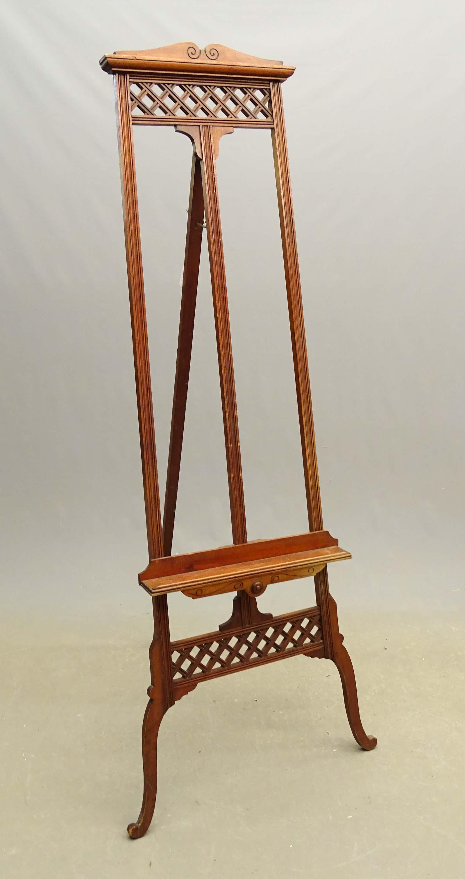 Easel: Eastlake easel. Provenance: Leo Blake Home. 75" Ht..
