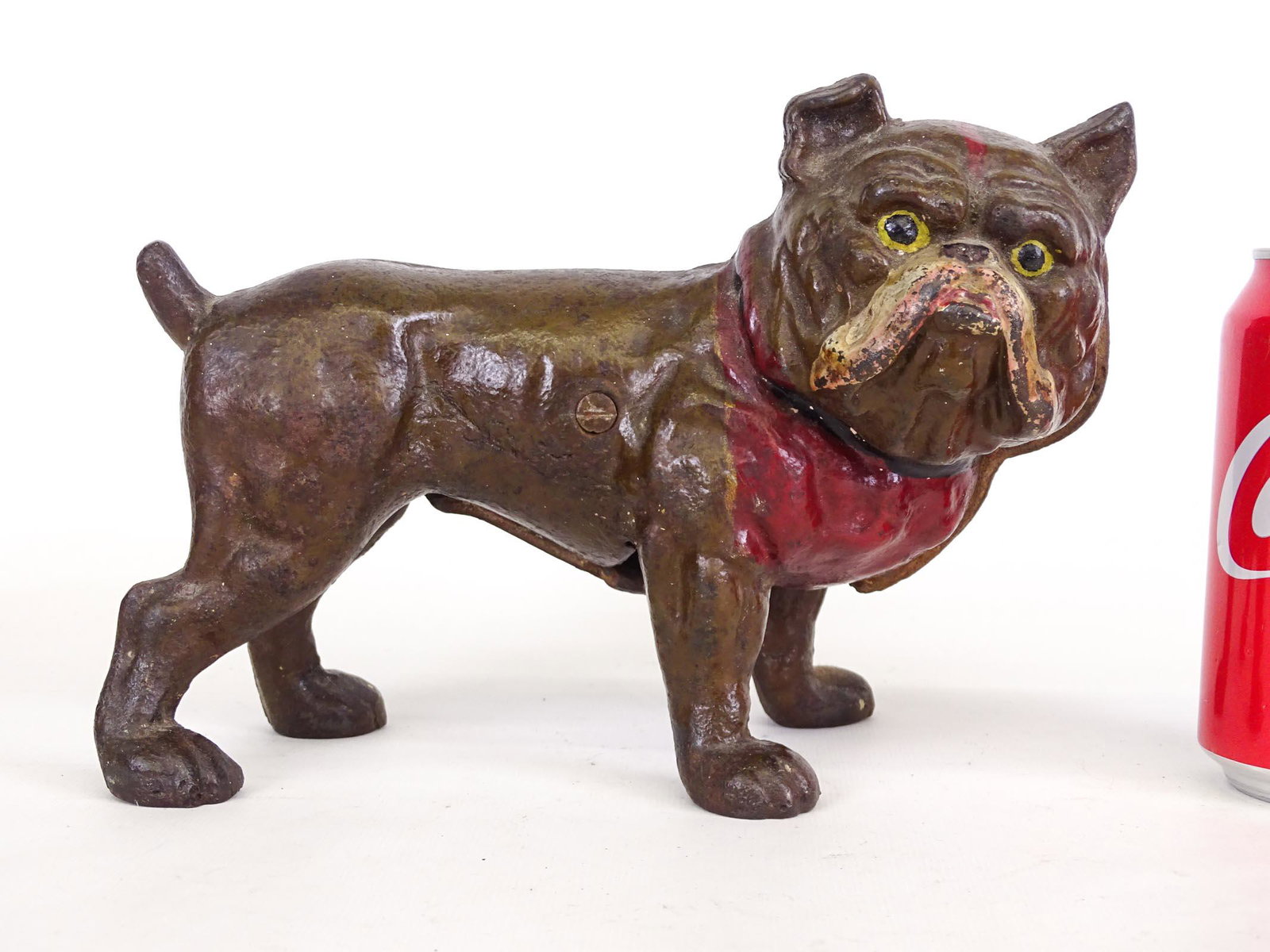 Doorstop: Early cast iron English bulldog. 9" x 6". Slightly pulling apart.