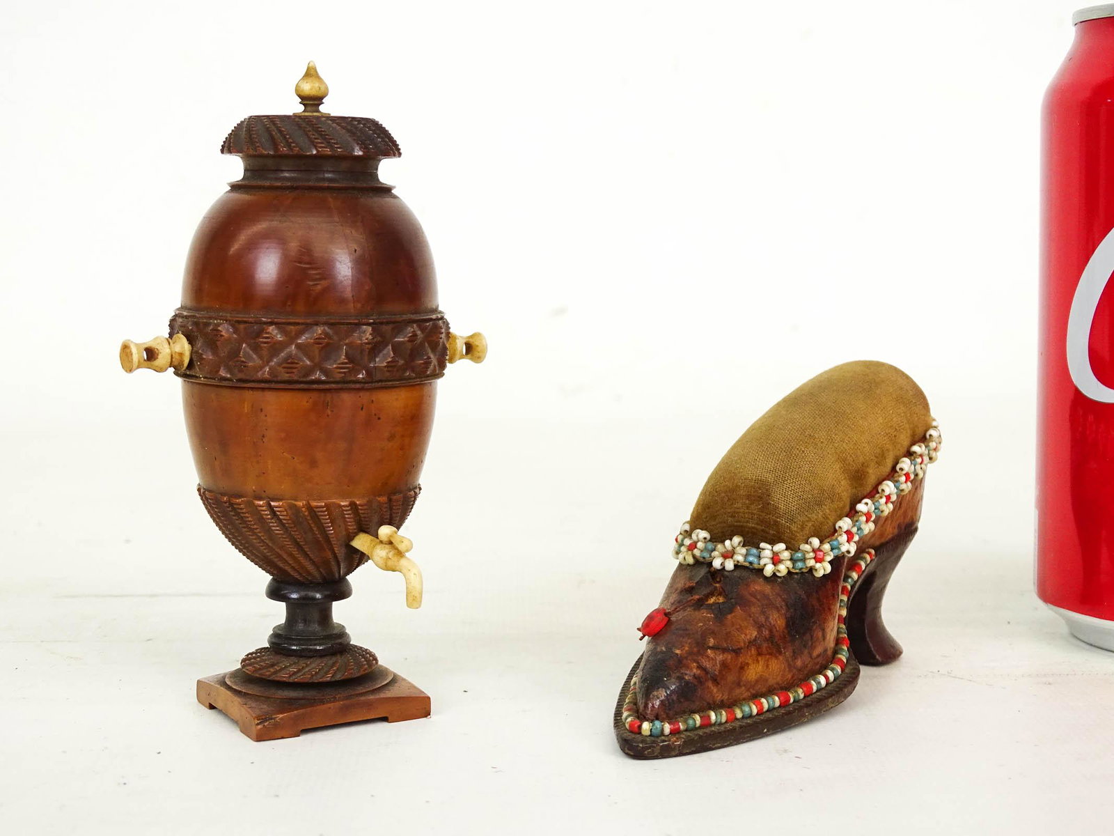 Misc. Lot: Lot including 19th c. cherry and bone miniature sewing urn with thimble, bone tools (4 1/2" Ht.), along with shoe pin cushion (leather covered, stuffed velvet cushion 4" L.).