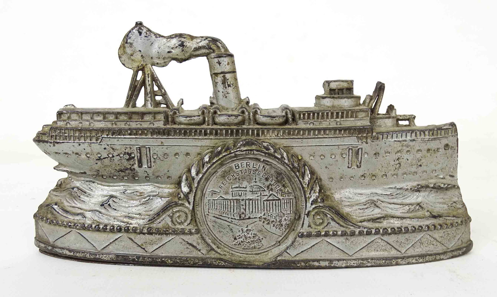 Bank: Lead Ocean Liner bank. Berlin Touring Boat. 7 1/2" W., 3 3/4" Ht..
