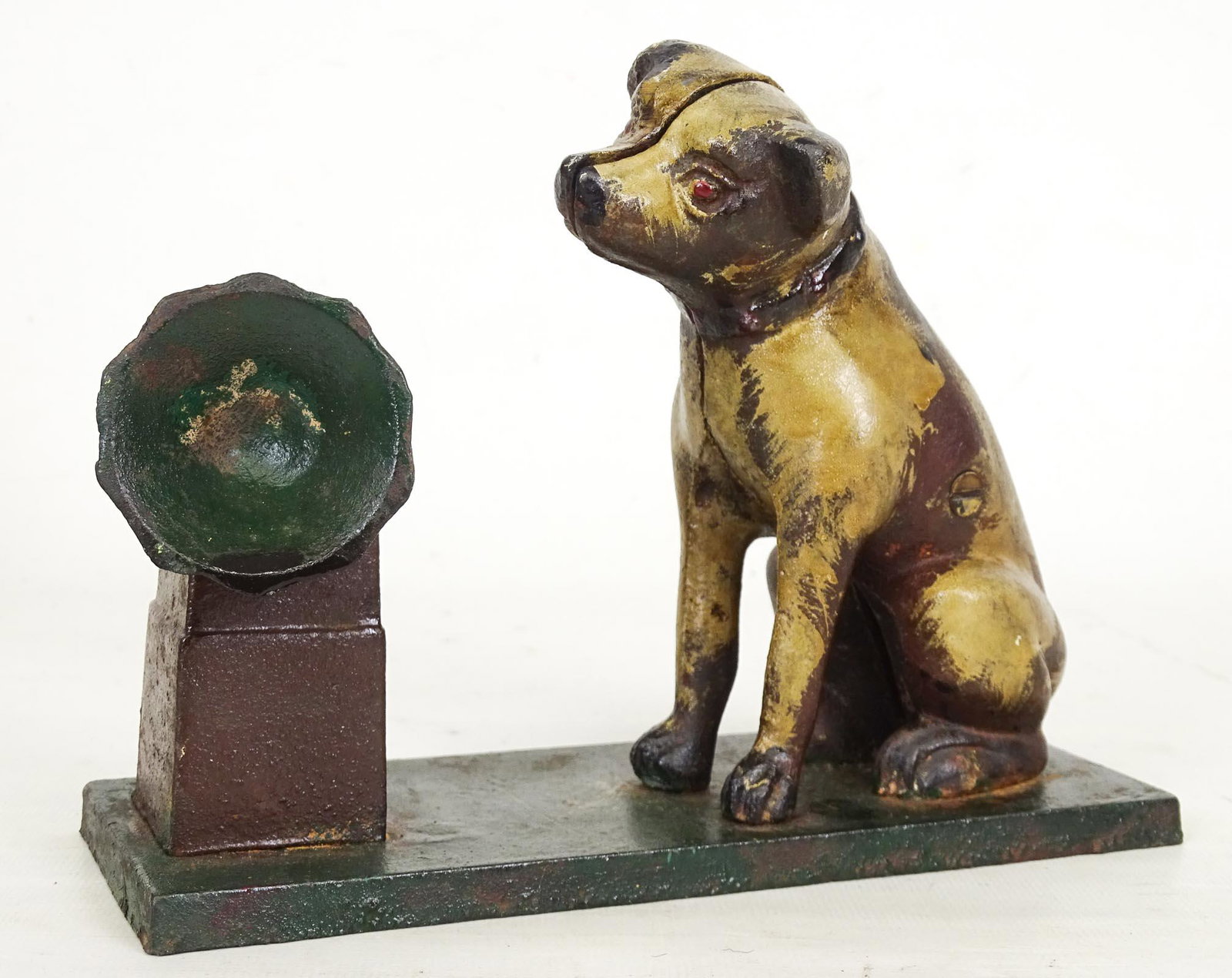 Bank: Cast iron Nipper Dog with Victrola still bank. 8" W., 6 1/2" Ht..