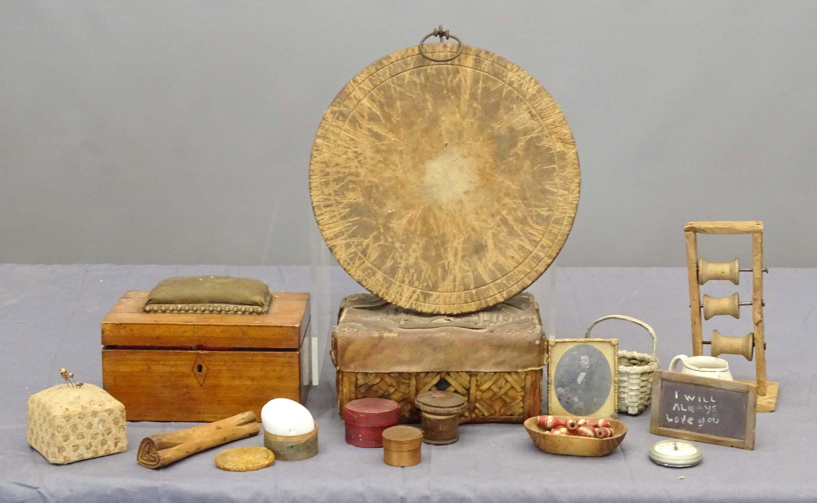 Misc. Lot: Misc. lot including rare miniature wooden bowl (4" L.), miniature knock down pins, miniature pantry box with turtle inside (turtle legs move), pocket watch on board, photograph, miniature painted bask