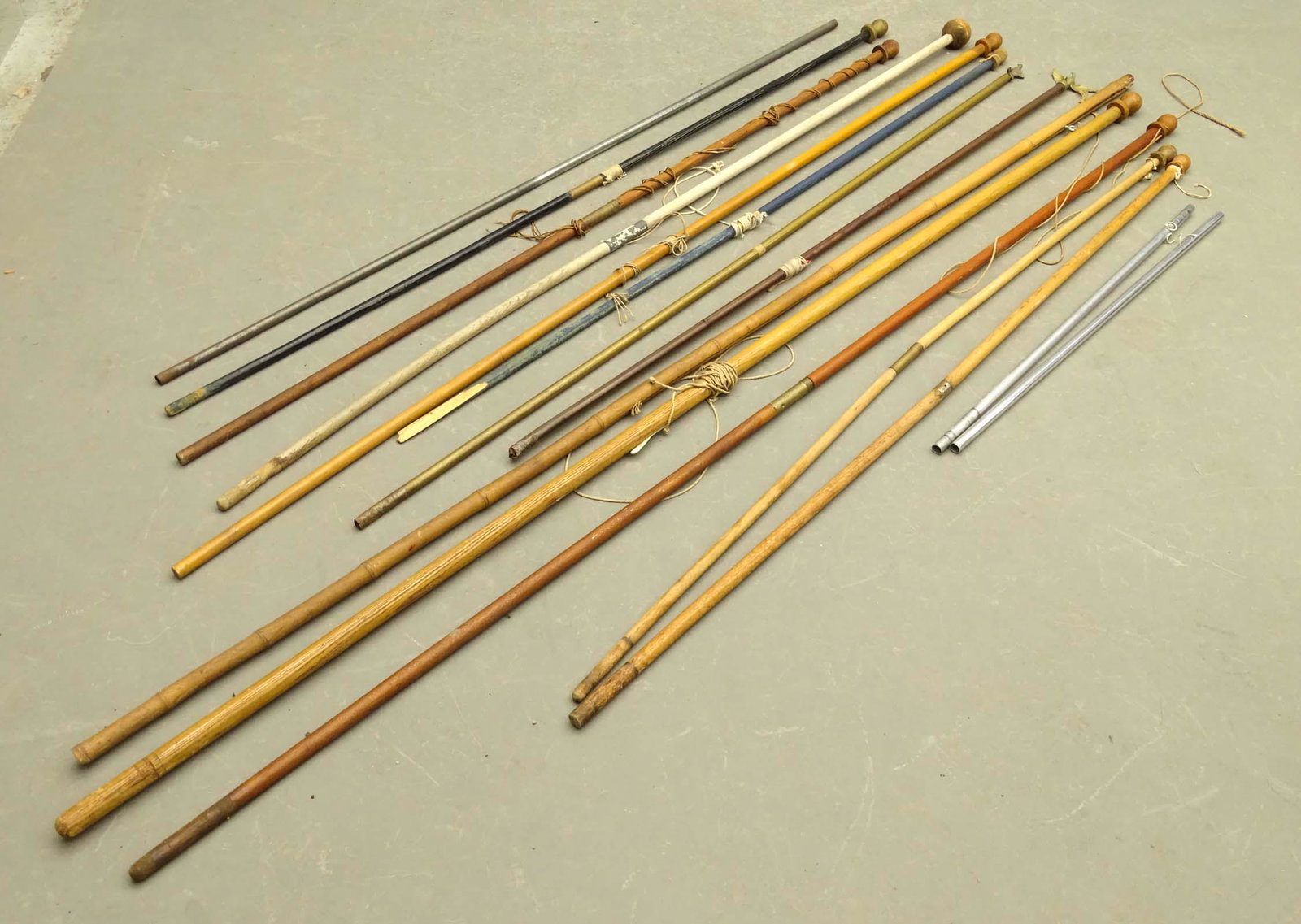 Flag Poles Lot: Lot of assorted flag poles. Longest 93" L..