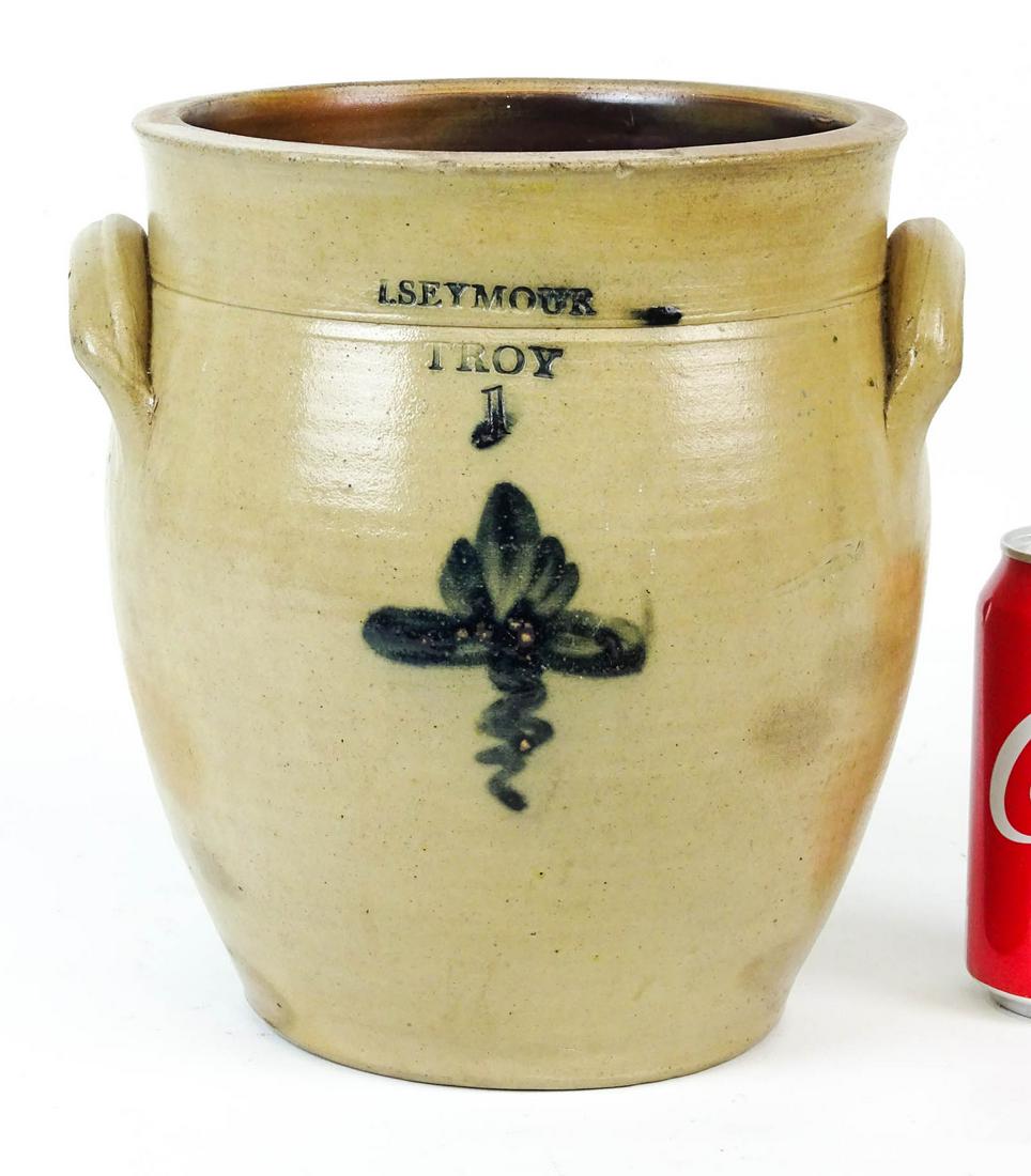 19th c. Stoneware Crock: 19th c. one gallon decorated stoneware crock "L. SEYMOUR / TROY". 9" D., 9 1/2" Ht..