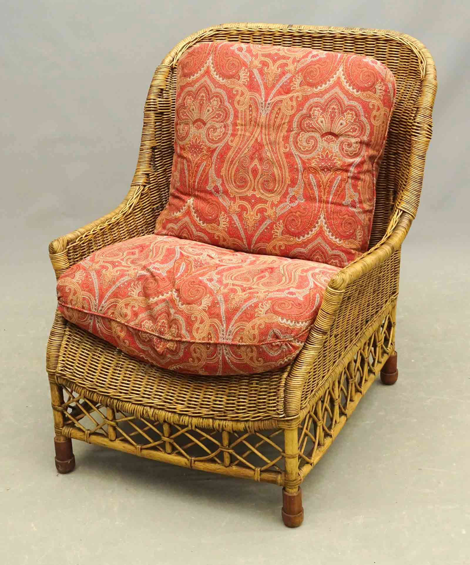 Wicker Chair: Decorative wicker chair with cushions. 16" seat Ht., 37" overall Ht.. Custom paisley cushions by Etro.