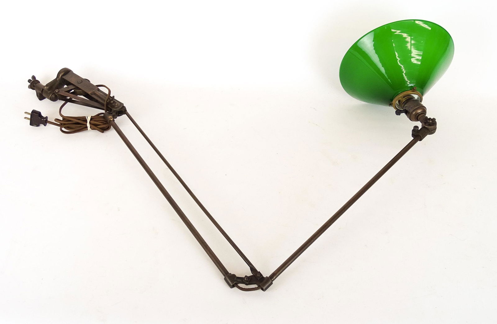 Industrial Lamp: Industrial steel desk clamp lamp with green glass shade. Marked Dazor...St. Louis.