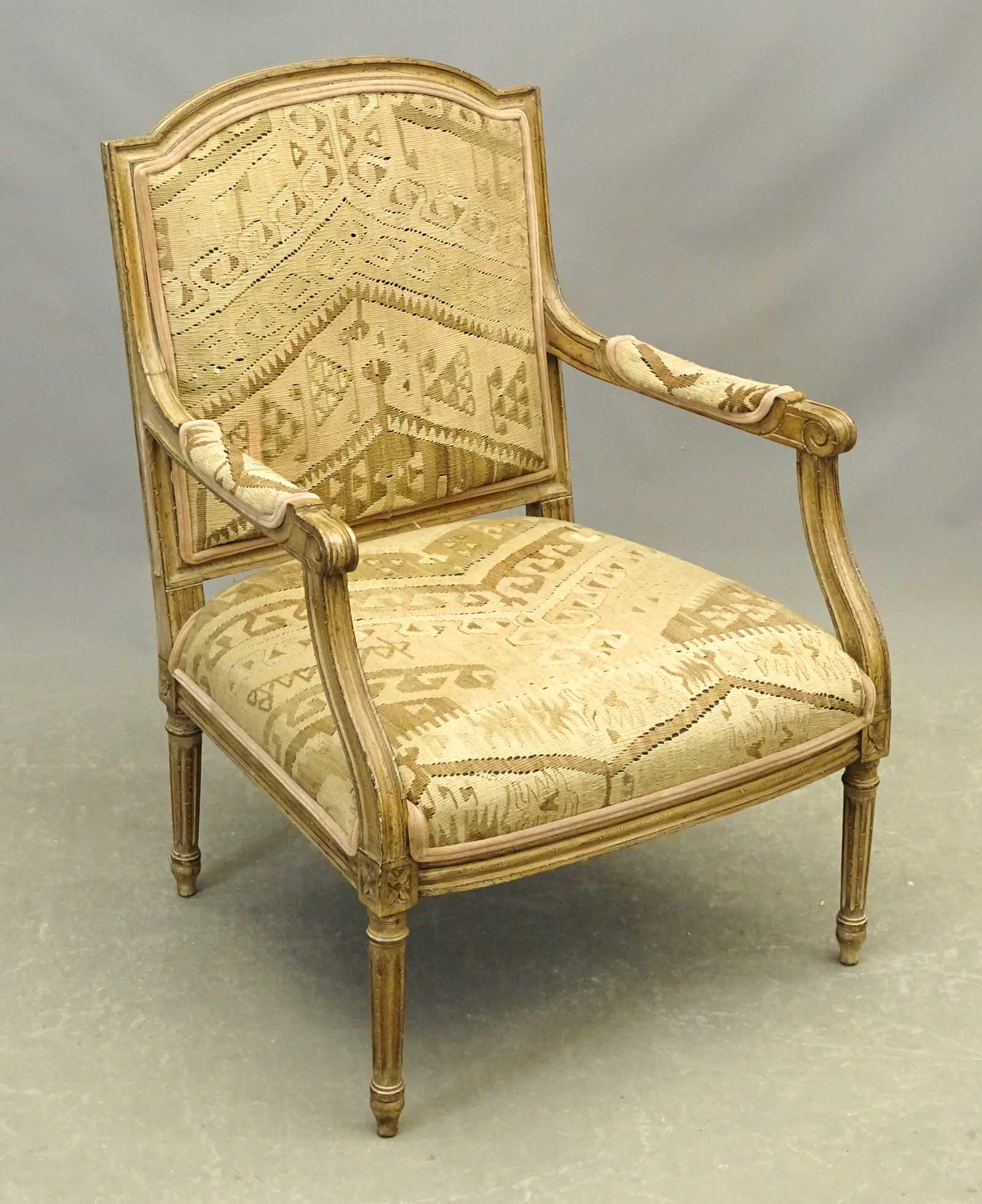 Upholstered Armchair: French style decorative upholstered armchair. 17" seat Ht., 38" overall Ht..