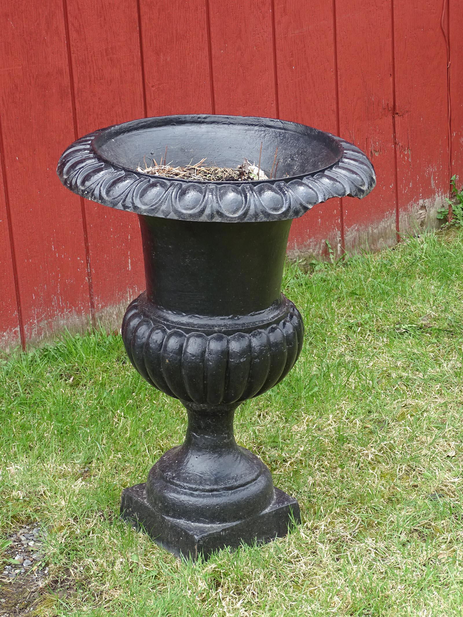 Cast Iron Urn: Cast iron urn. 22" Dia. x 30" Ht..