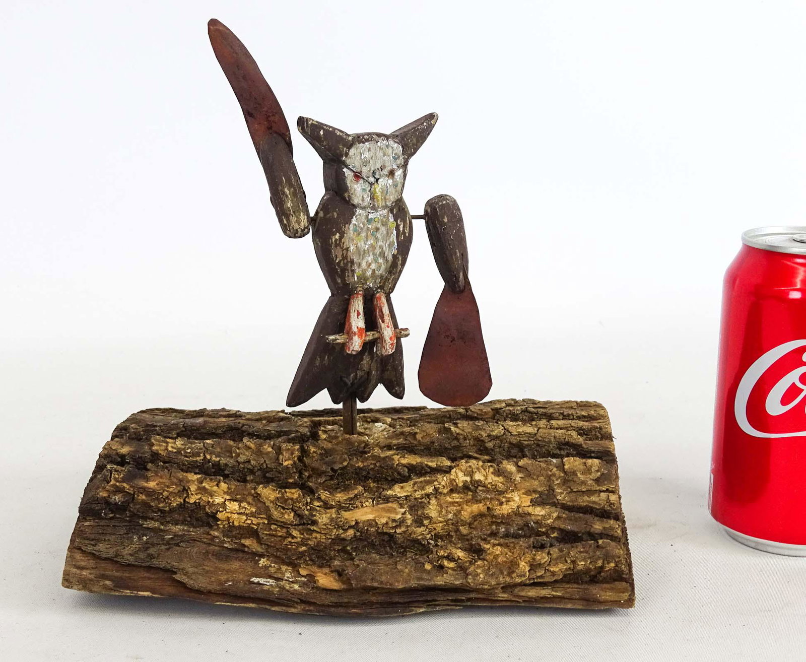 Owl Whirligig: C. 1900 hardwood folk art owl whirligig. 6 1/2" Ht.. On wood log base.