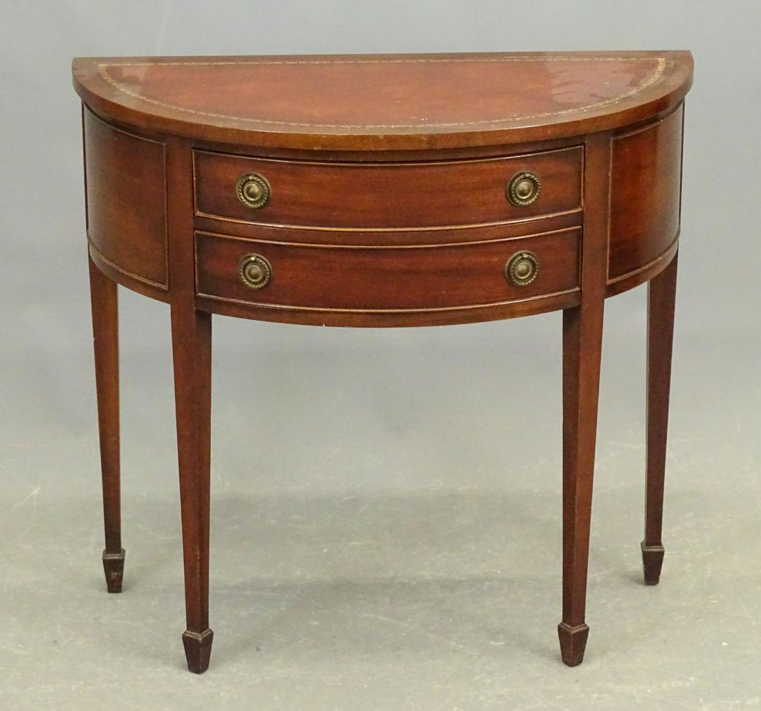 Demilune Mahogany Two Drawer Stand: Demilune leather top mahogany two drawer stand. 32 1/4" x 15 1/4" x 30 1/2".