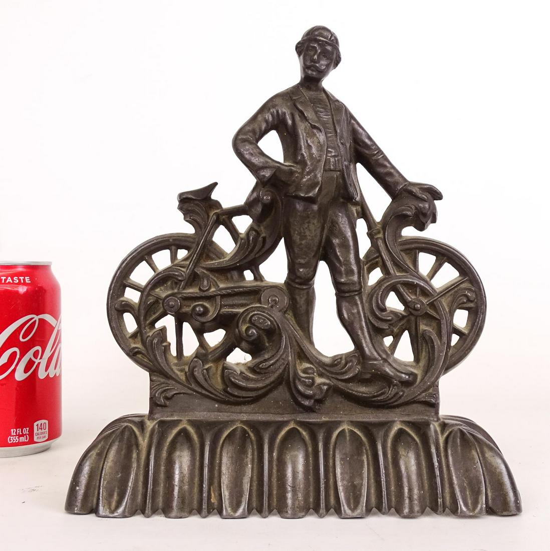 Cast Iron Safety Rider Doorstop: Scarce cast iron Safety Rider doorstop. 8 1/2" x 10".