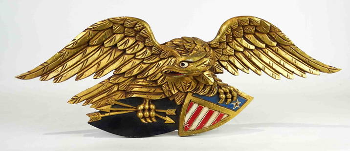 Carved Wooden Eagle: Carved and painted wooden eagle. 24" x 10".
