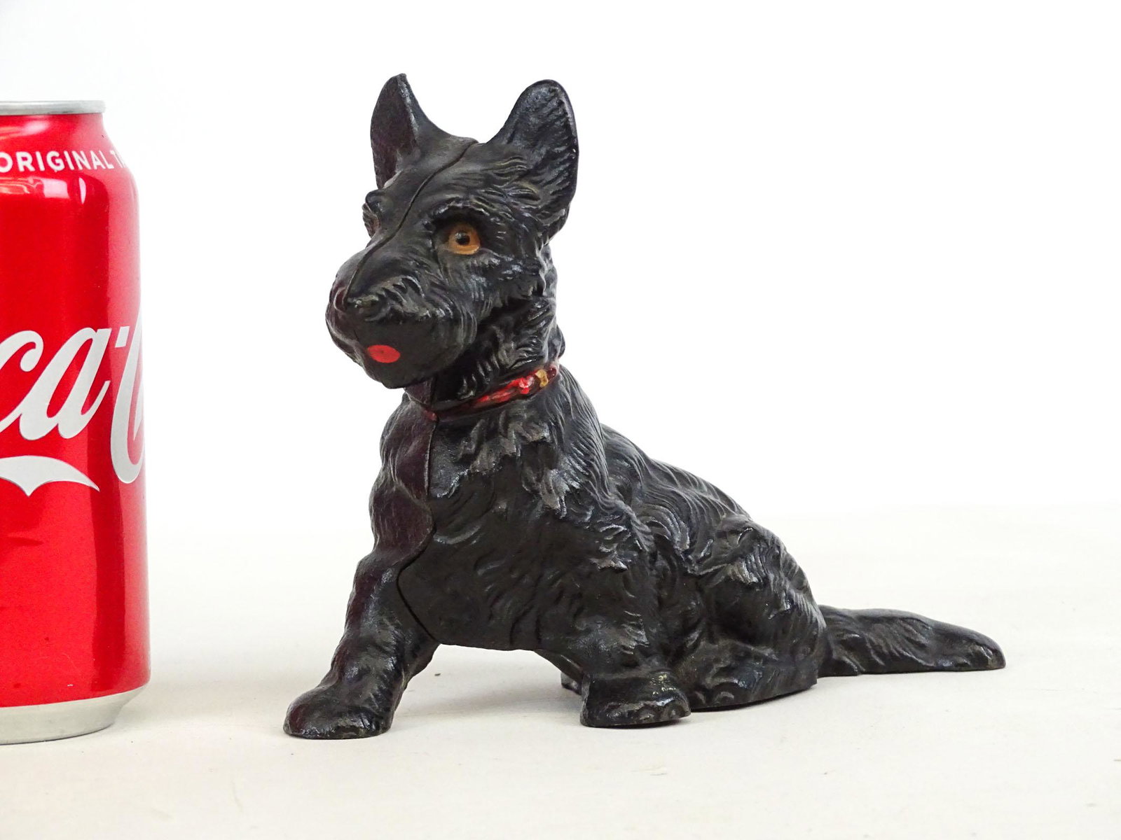 Hubley Scottie Dog Bank: C. 1930's Hubley cast iron Scottie Dog bank. 5" Ht..