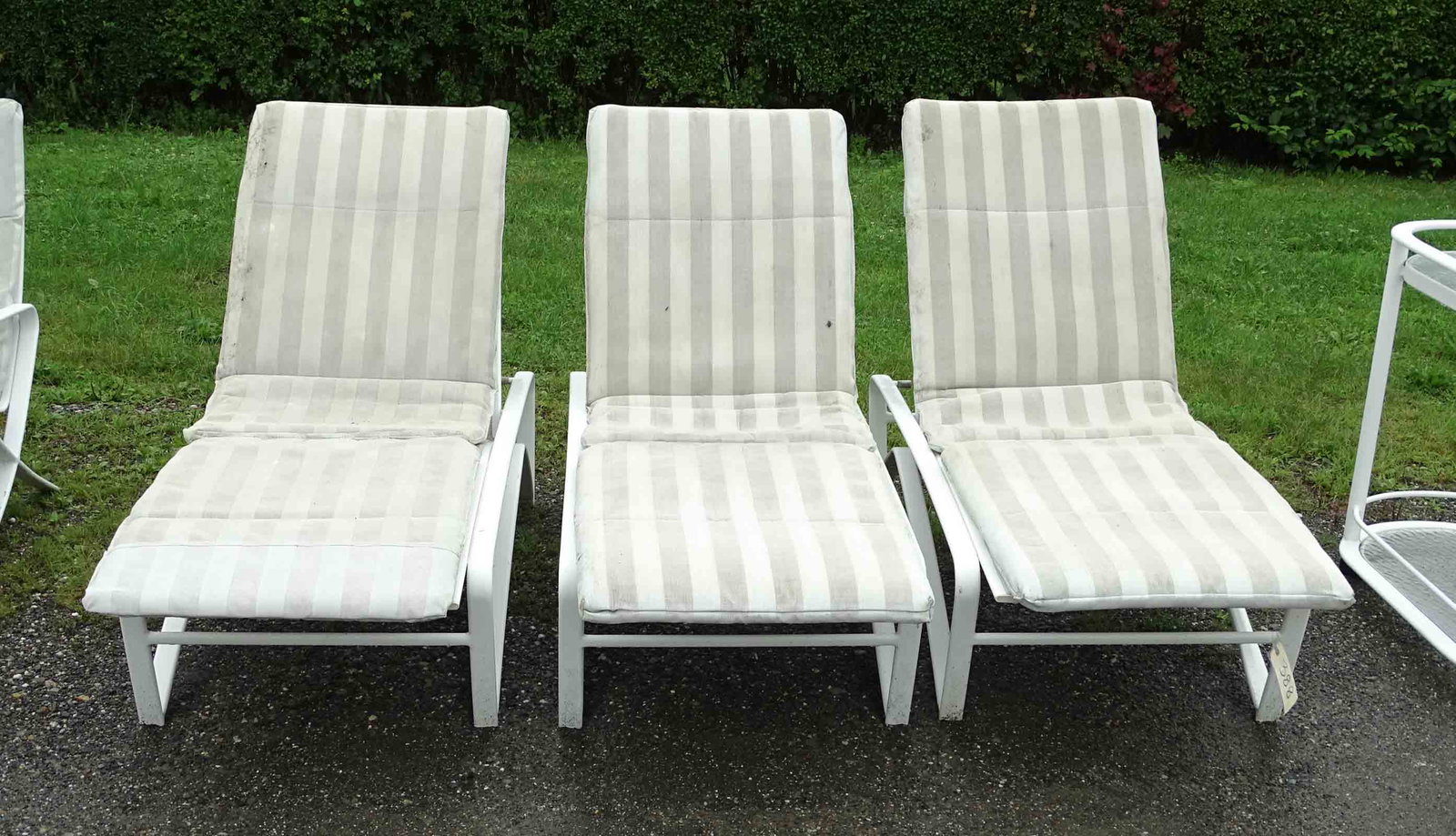 Brown Jordan Patio Lounges: Brown Jordan patio lounges. 78" L., 27" W., 17" Ht.. Includes cushions (soiled).