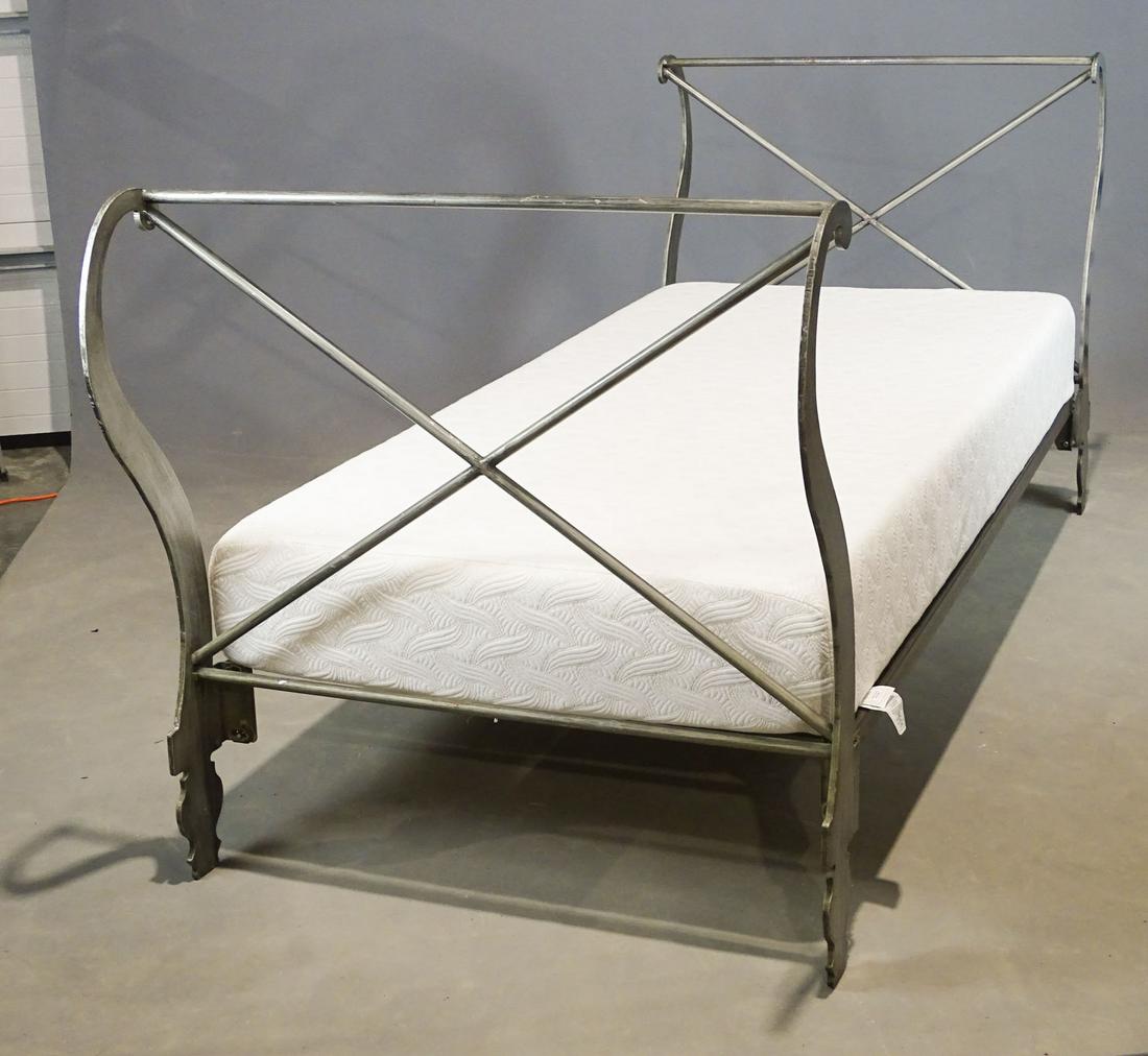 Daybed: Iron decorative daybed with mattress and boxspring. 40" x 42" (headboard, footboard), boxspring 77" x 38 1/2", mattress 77" x 37".