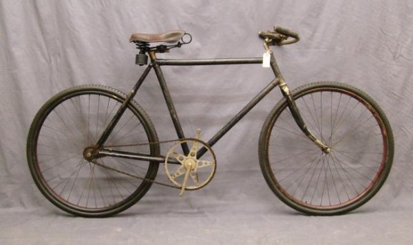 C. 1900 Pneumatic Safety Bicycle: Circa 1900 pneumatic safety Bicycle with large "Star" chain ring, matching Gillette Ambassador tires and painted wooden rims (black and red), persons saddle. Good condition.